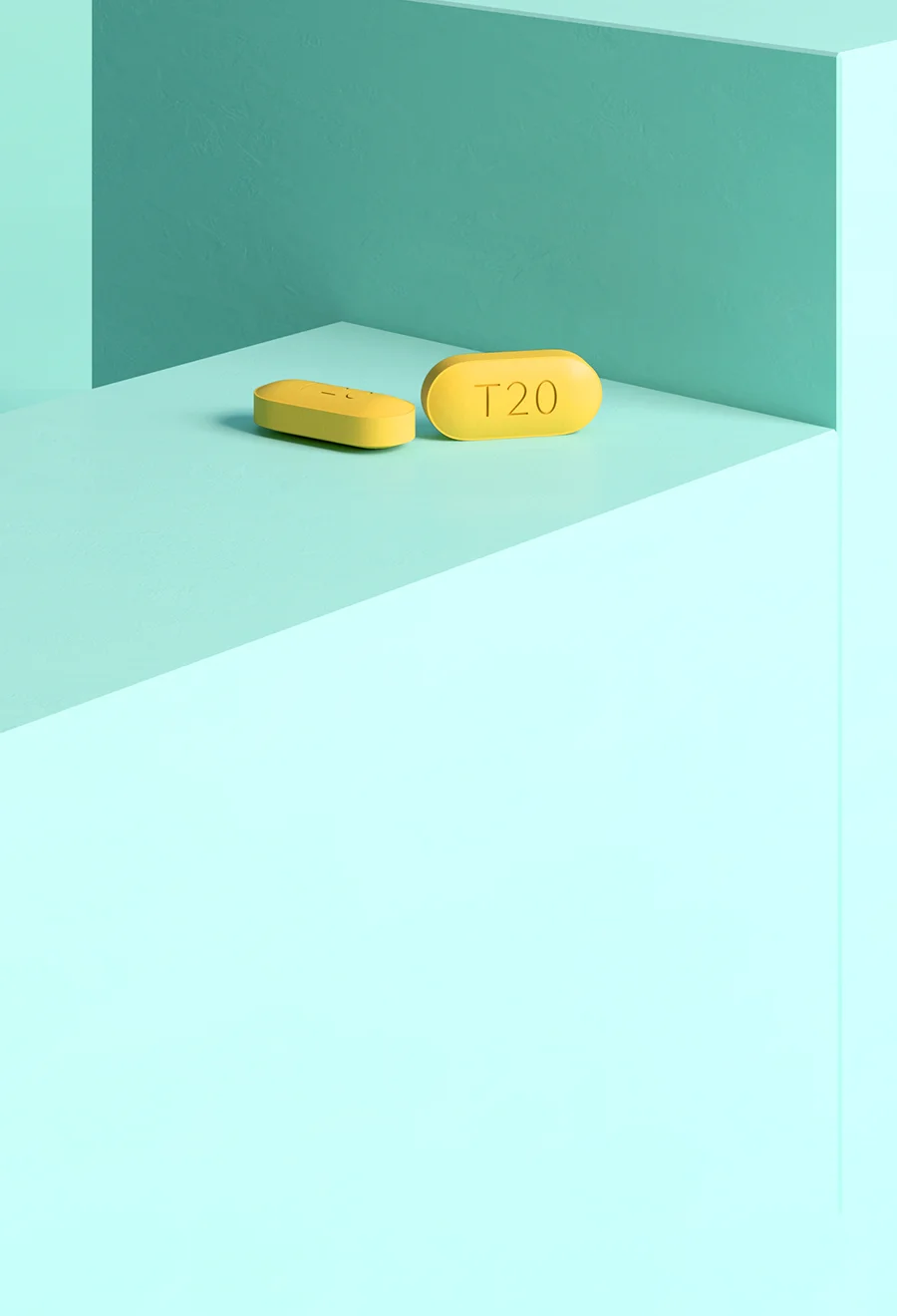 ミントグリーン色の台の上にある2錠のタダラフィル 20mg