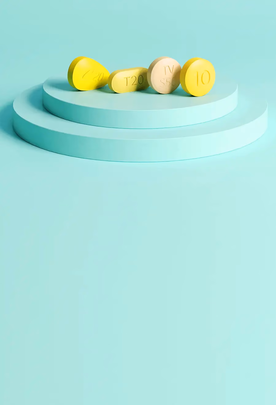 ミントグリーン色の台の上にある4錠の異なる種類の勃起不全薬