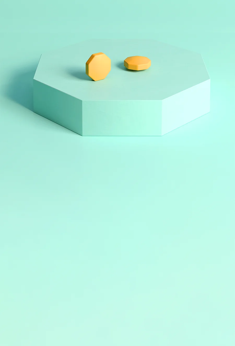 ミントグリーン色の台の上にある2錠のフィナステリド1mg