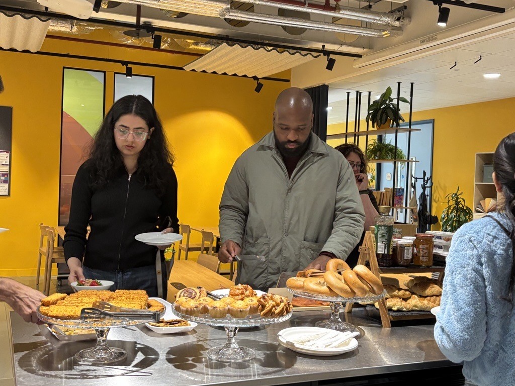 Plus X Innovation members at a breakfast networking session