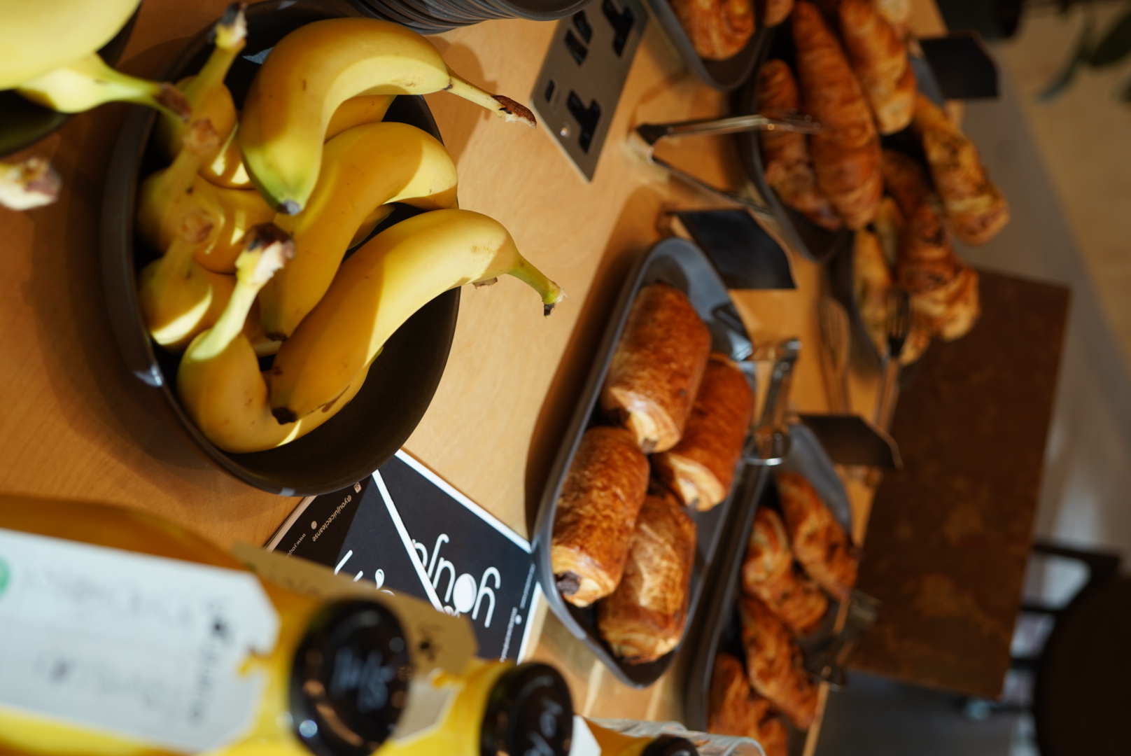 Banana and Pastries spread at the weekly breakfast networking at Plus X Innovation .