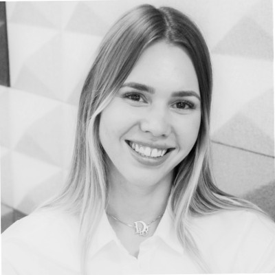 White blonde woman smiling