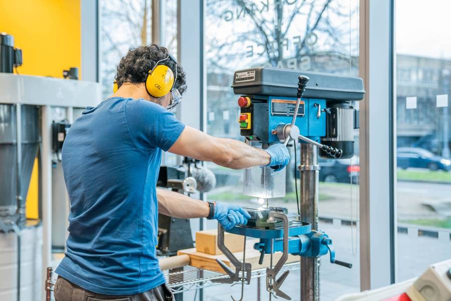 A man manufacturing something in a workshop