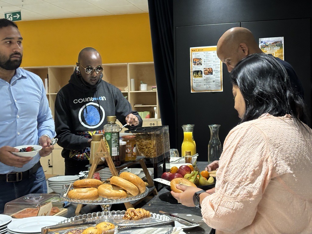 Plus X Innovation Members at a Weekly Breakfast Networking Event.