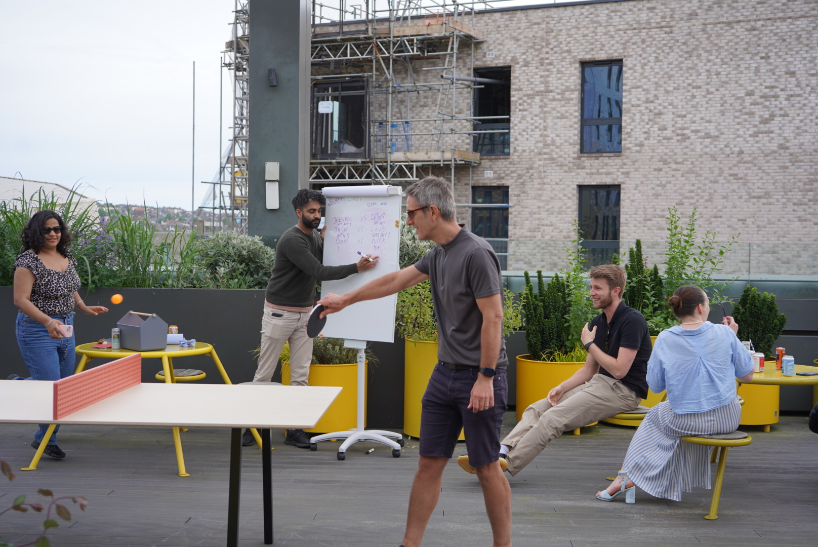 Plus X Innovation members participating in a weekly social games together.