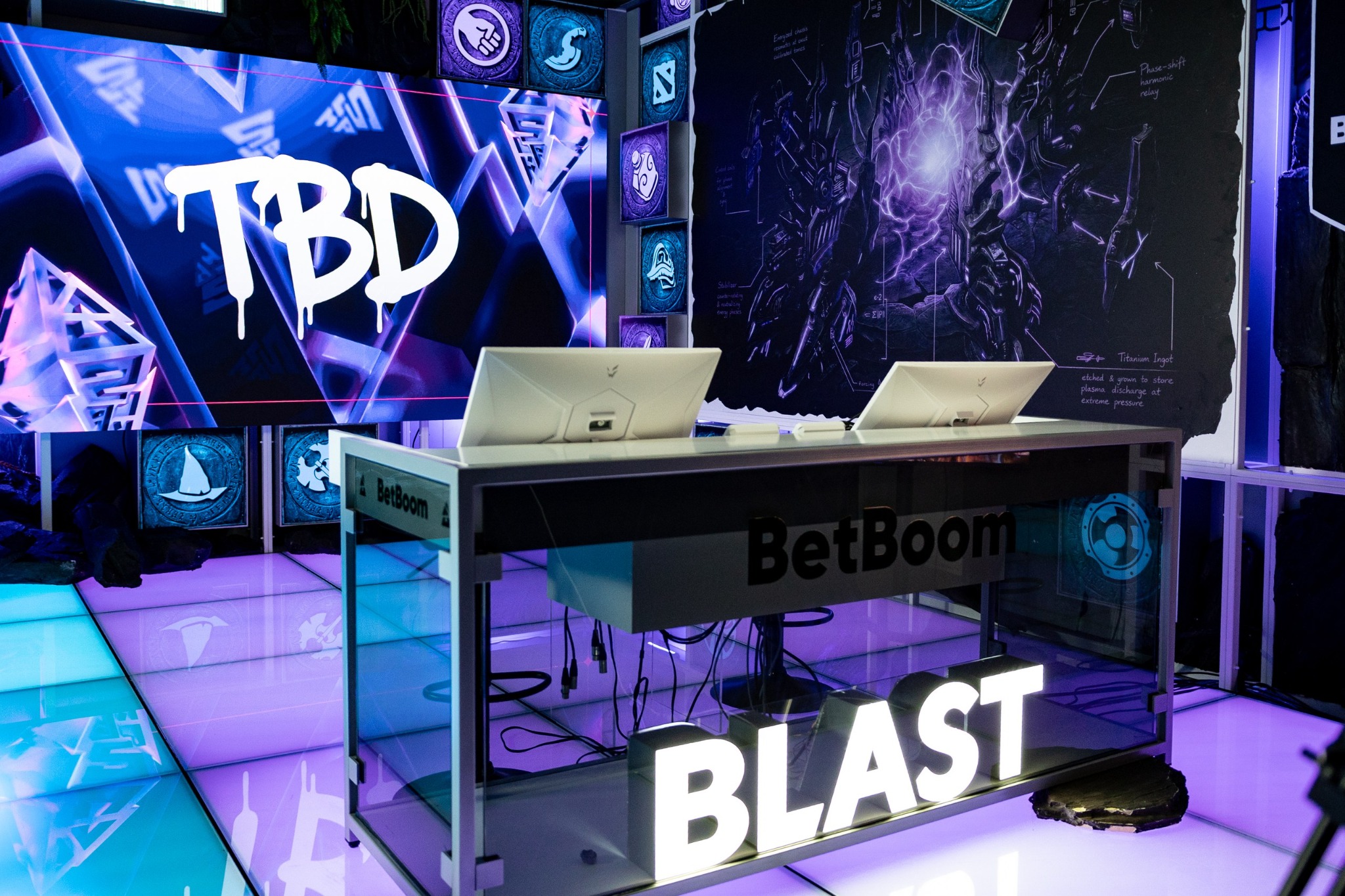 Empty BetBoom broadcast desk inside the completed BLAST Studio