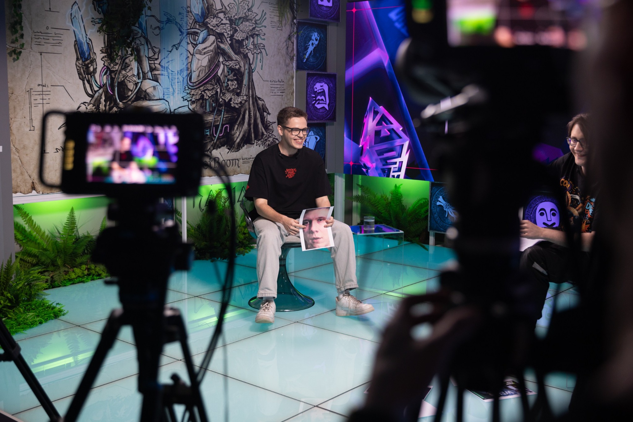 On-camera conversation filmed inside BLAST Studio