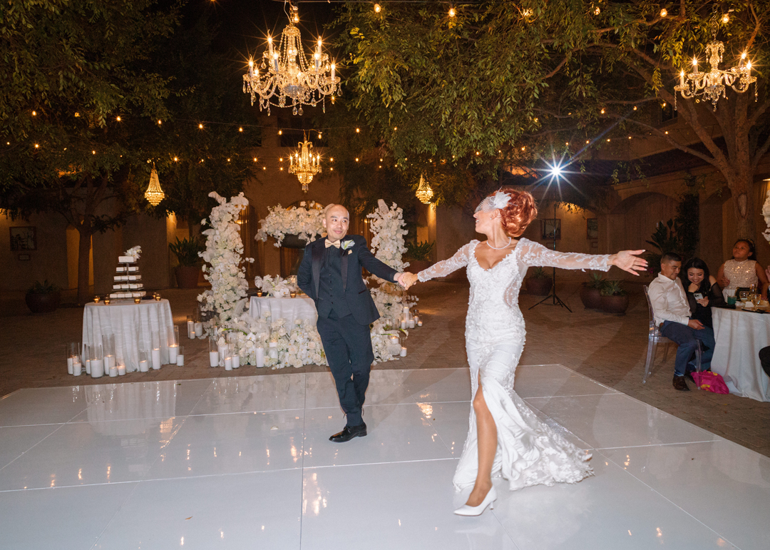 Bride and groom share first dance.