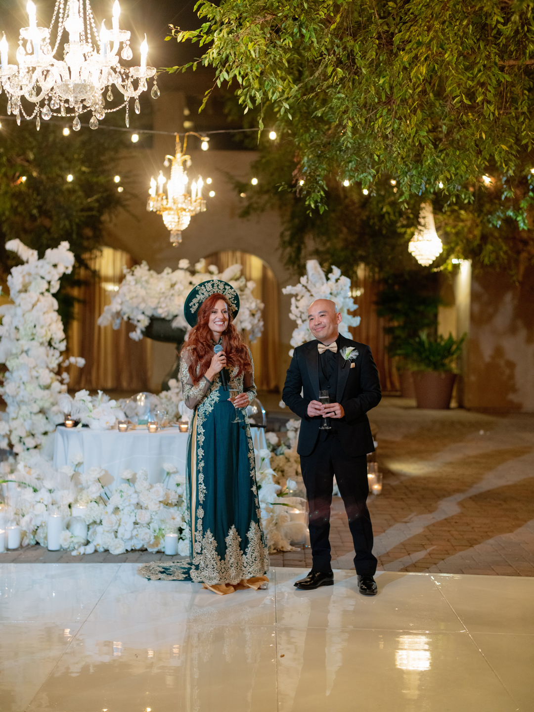 Bride and groom share a toast.