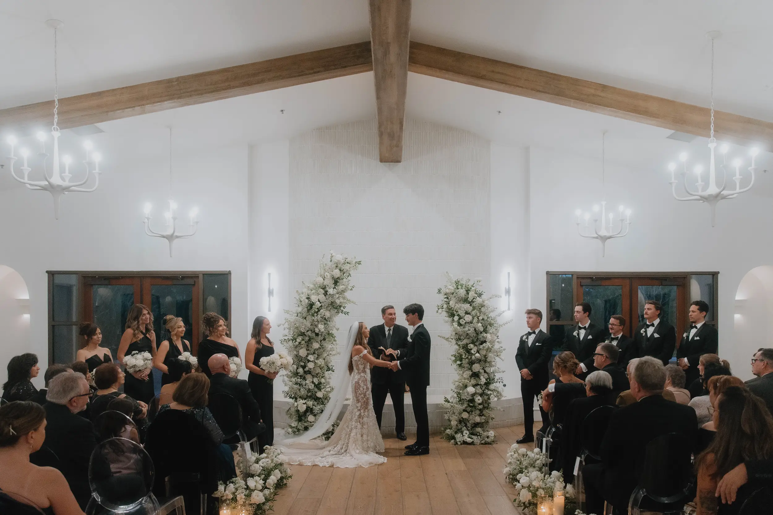 Bride recites vows inside the Lounge at Serra Plaza.