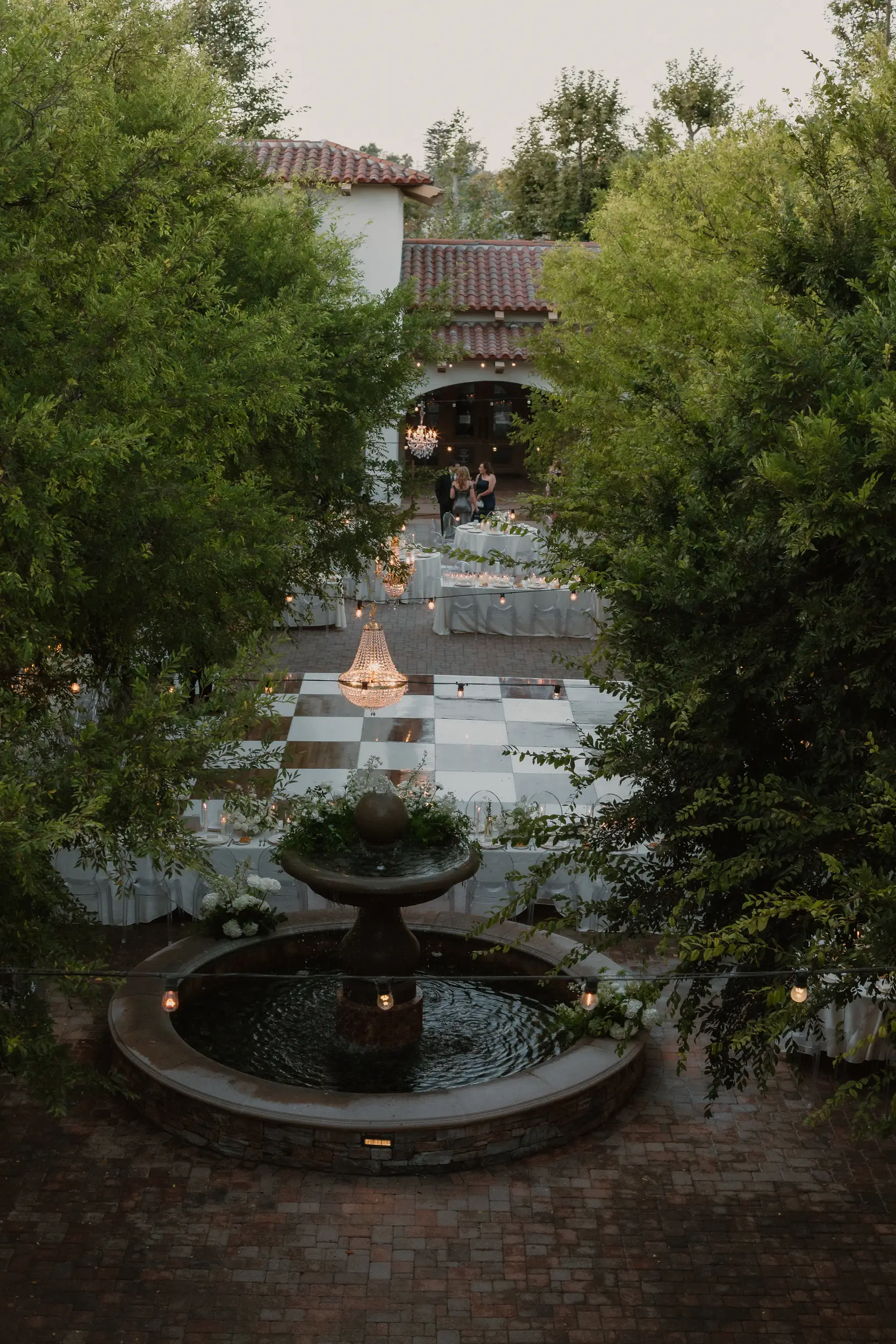 Outdoor wedding reception in the Serra Plaza Courtyard.
