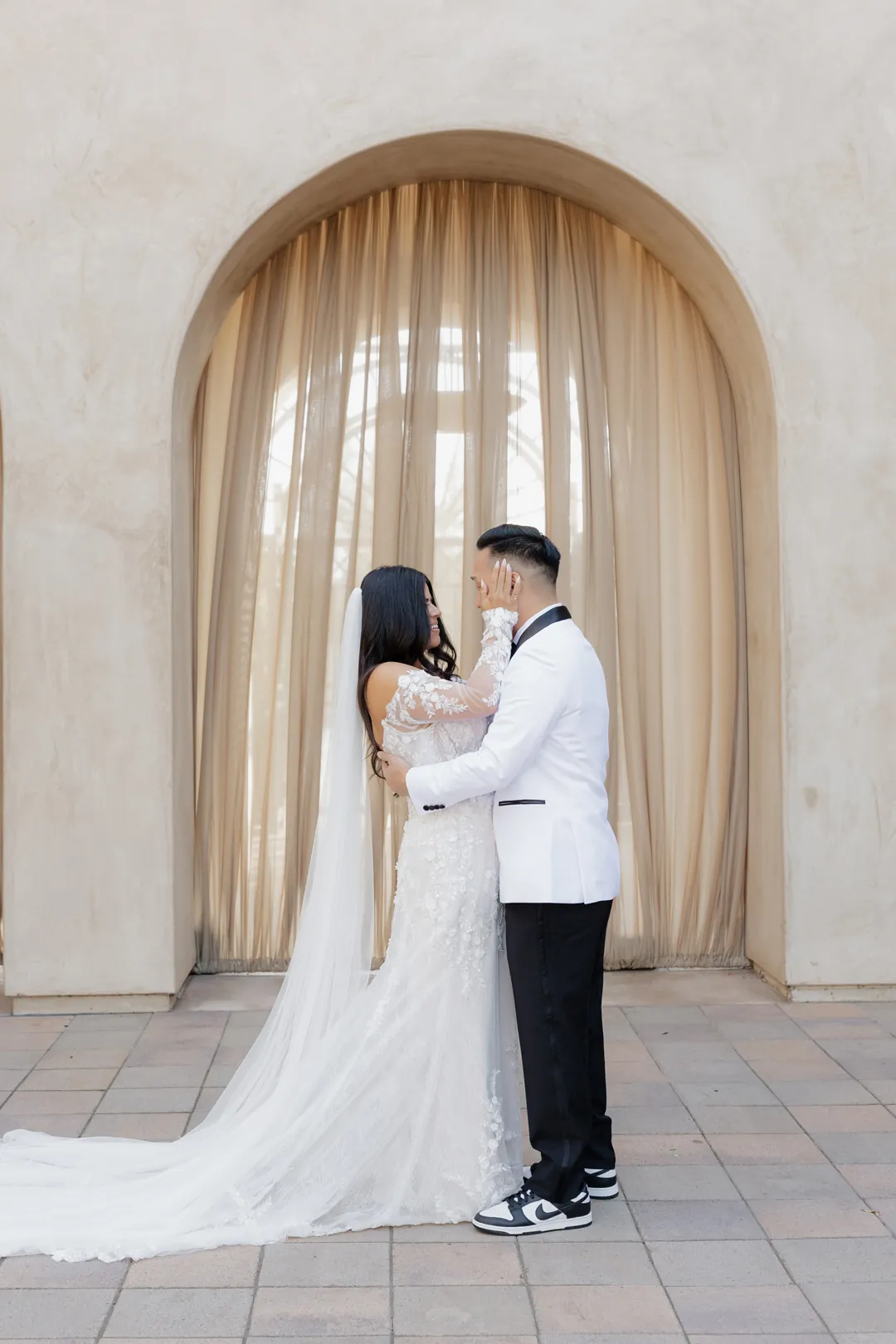 Bride and groom shed happy tears during their first look.