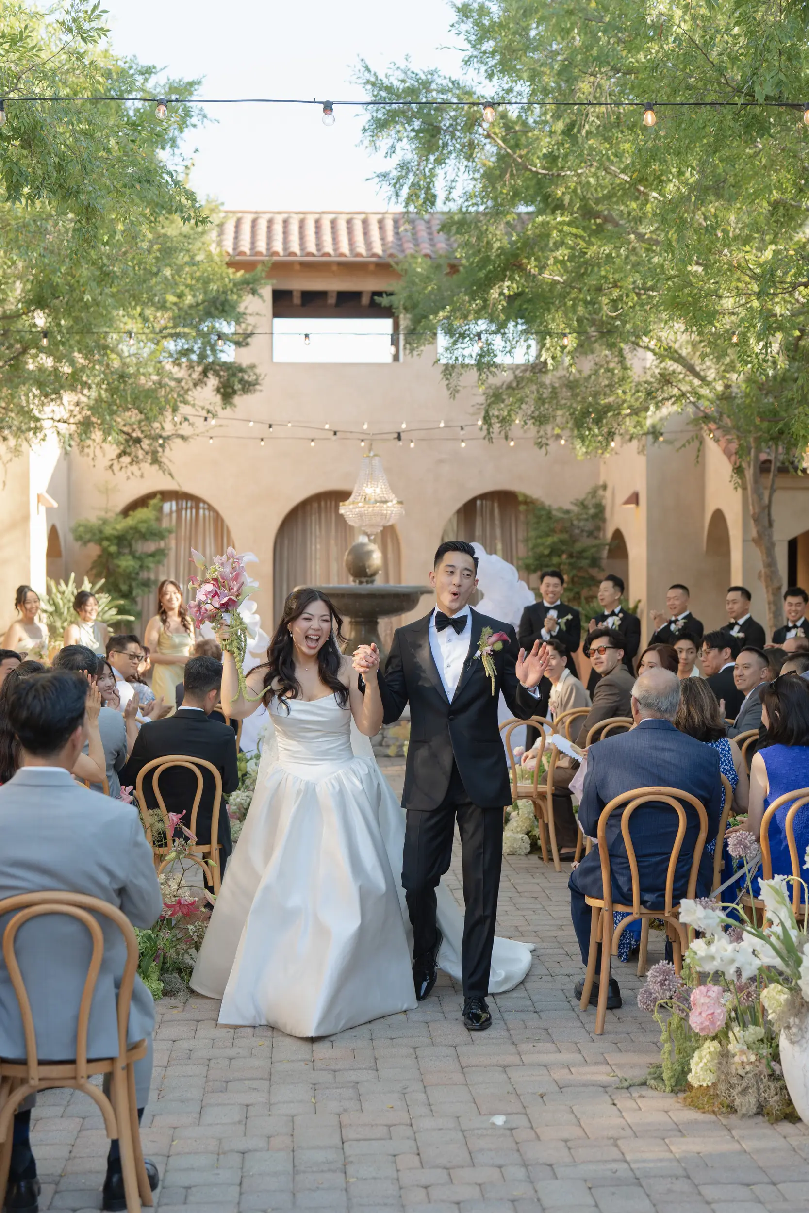 Outdoor wedding ceremony at Serra Plaza.