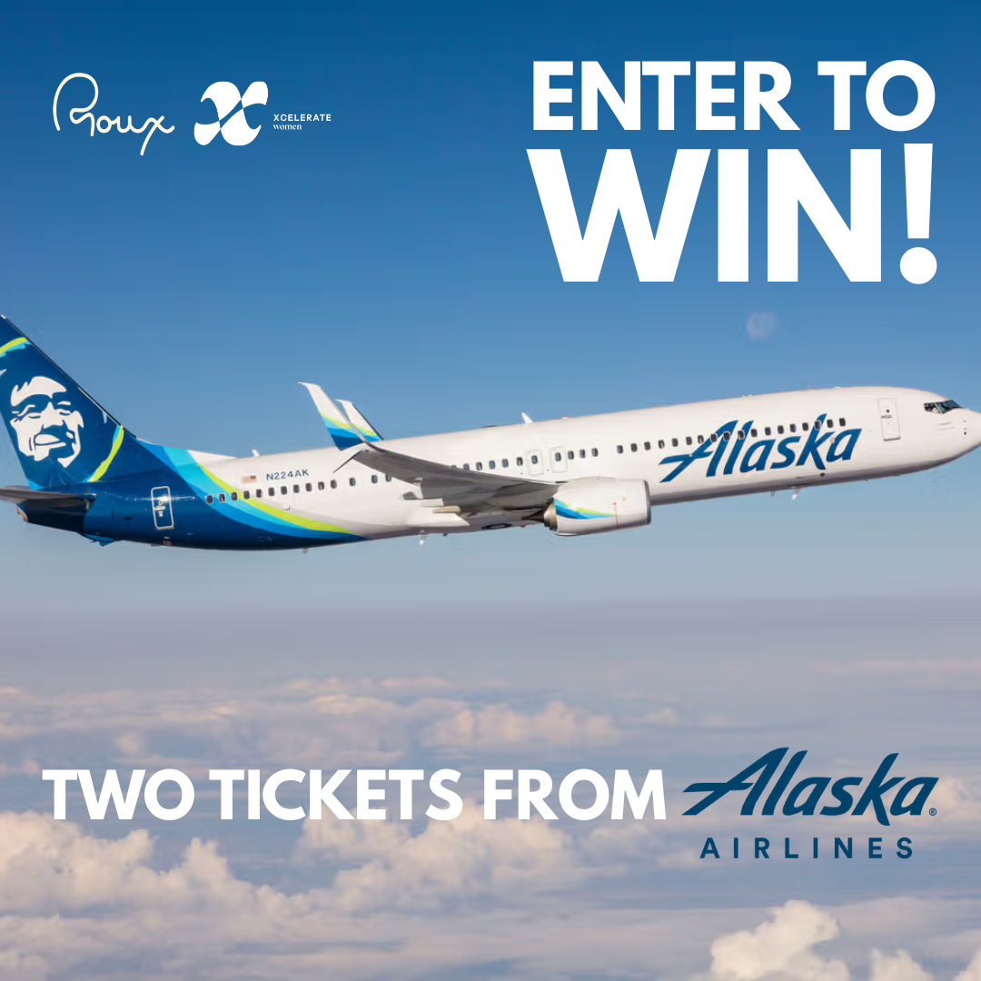 alaska airlines plane in the sky with "Enter to win"