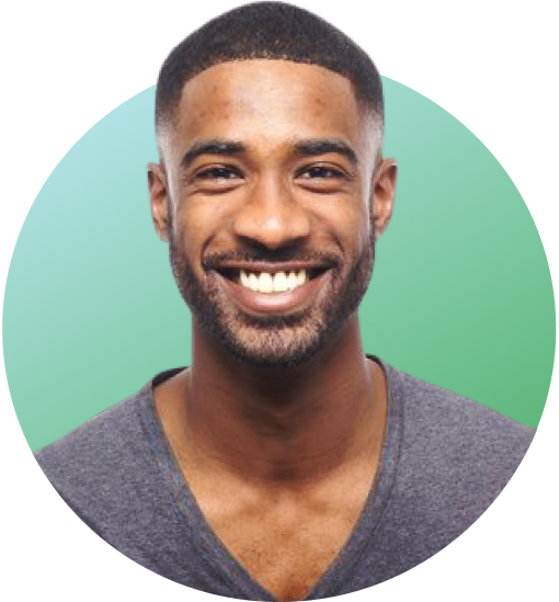 A man with a cheerful expression against a green backdrop.