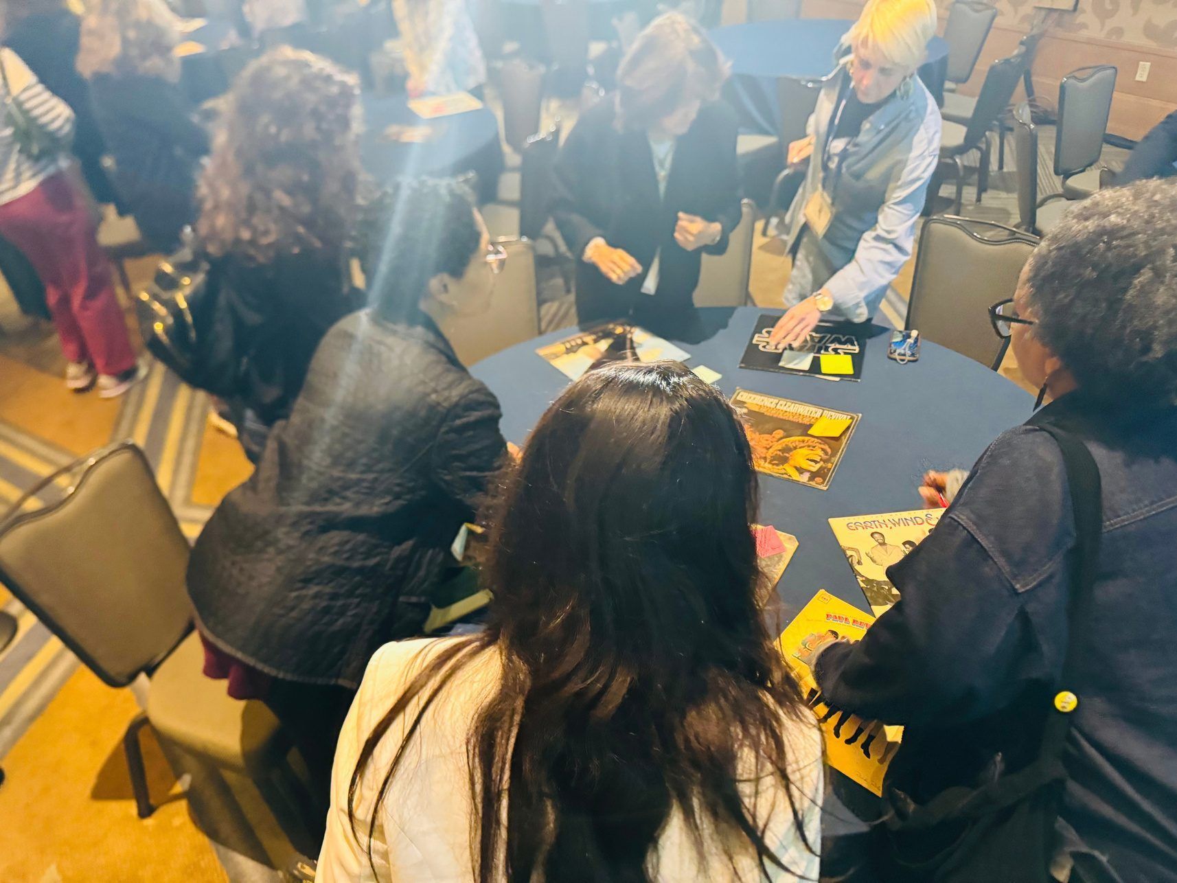 Workshop participants working together around a table