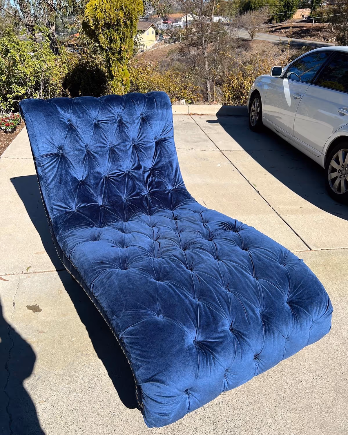 That same upholstered blue chair looking brand-new after professional cleaning.