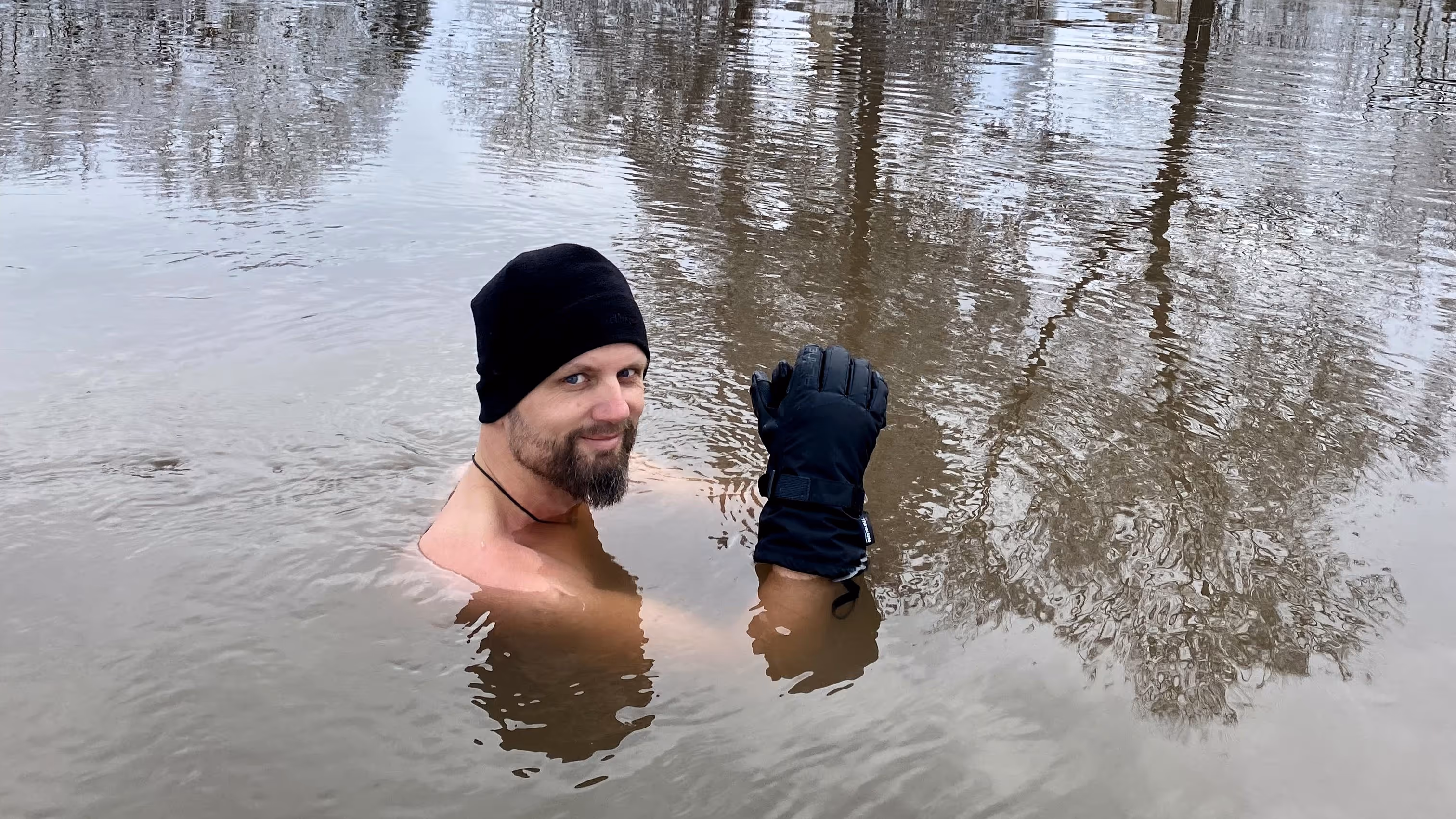 A man at the Menschels pool while taking an ice bath.