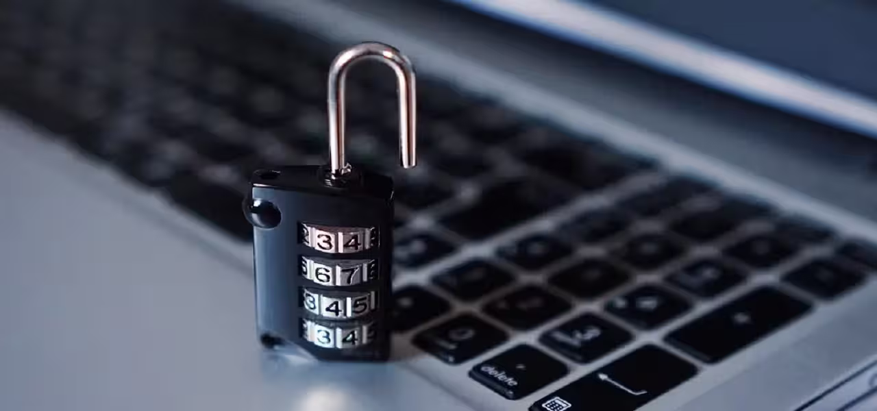 Open padlock on a computer keyboard symbolizing the protection of personal data and the GDPR in companies.