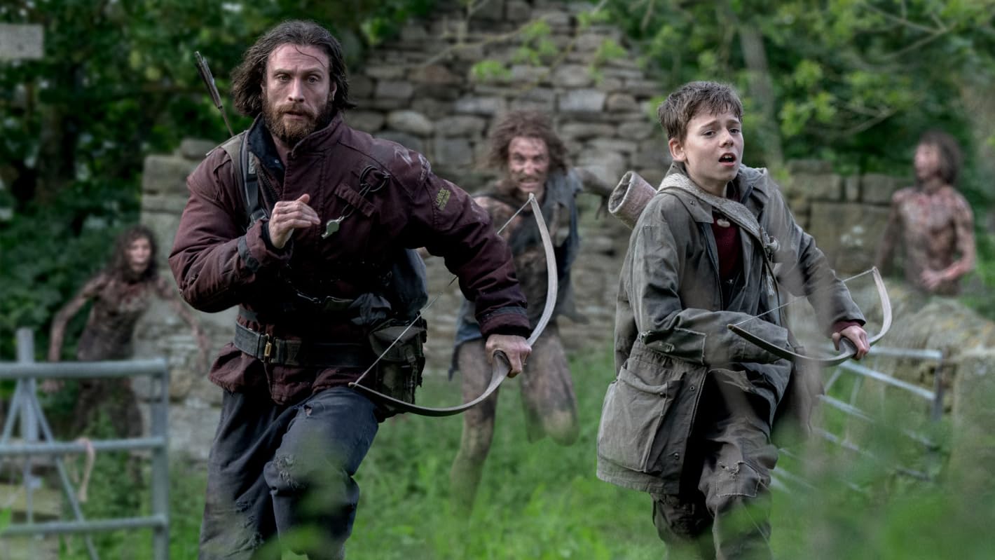 A father and son are running away from a group of zombies chasing them.