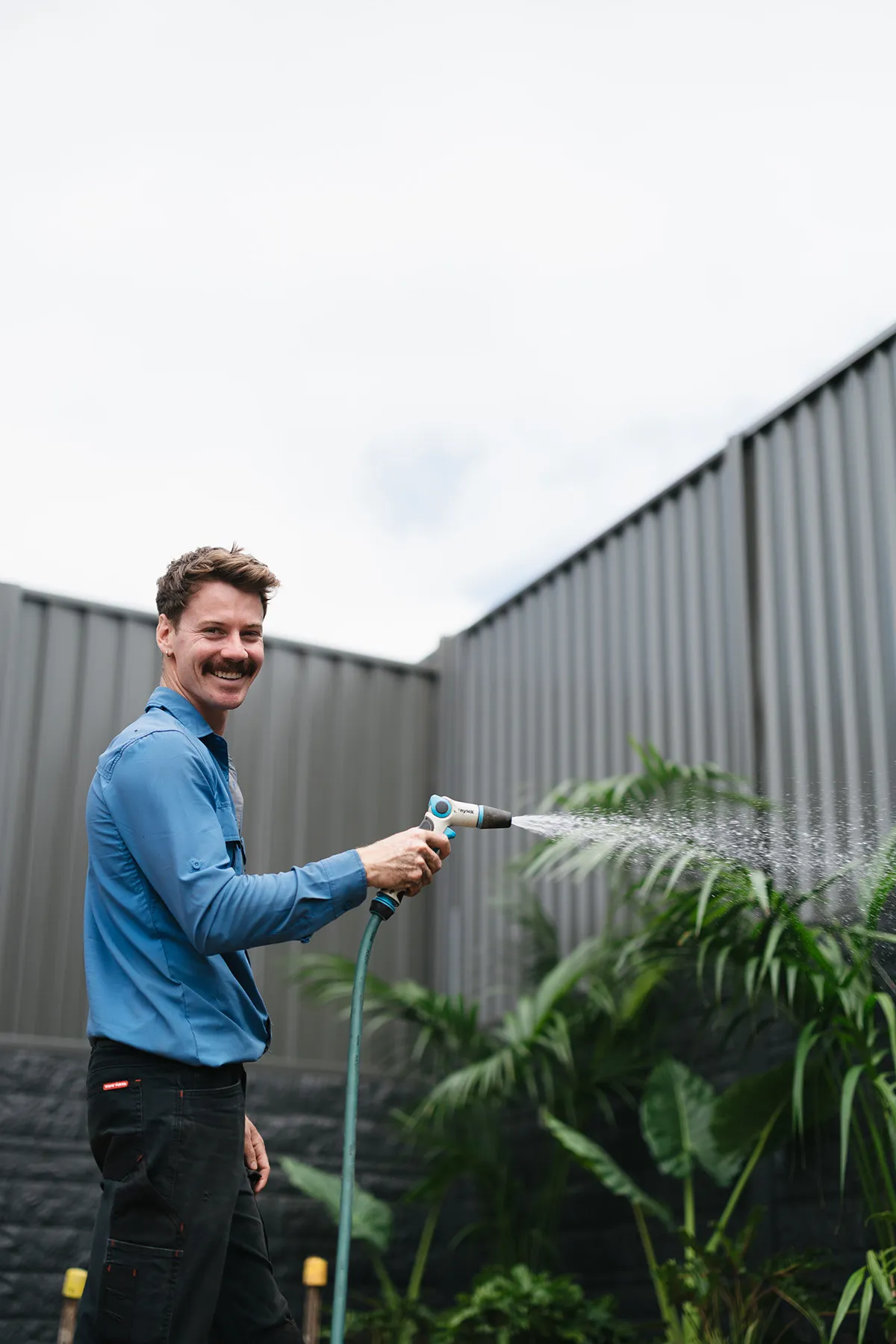Max Gordon mowing a lawn in Wollongong the best lawn mowing service