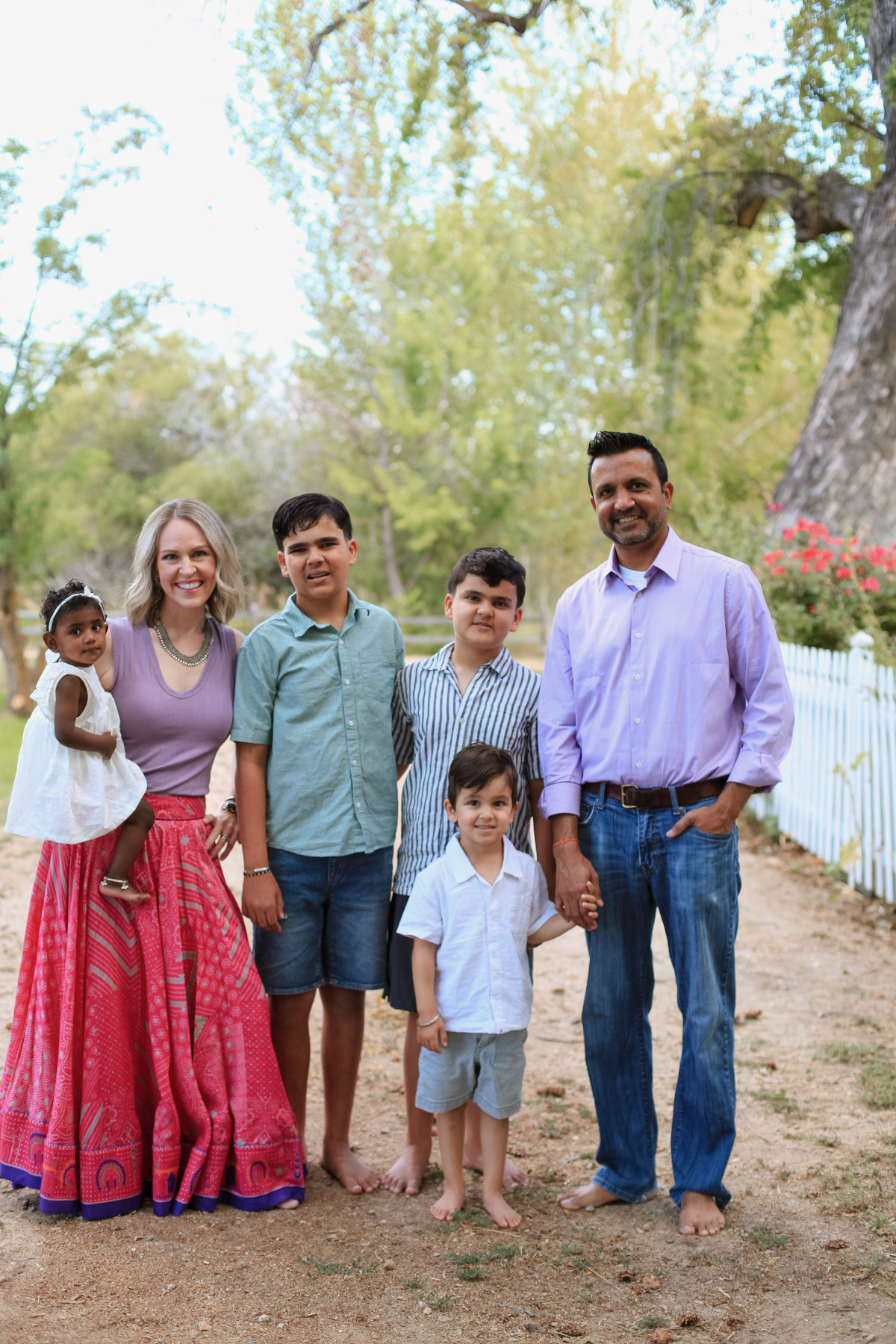 A family who adopted children through IAN