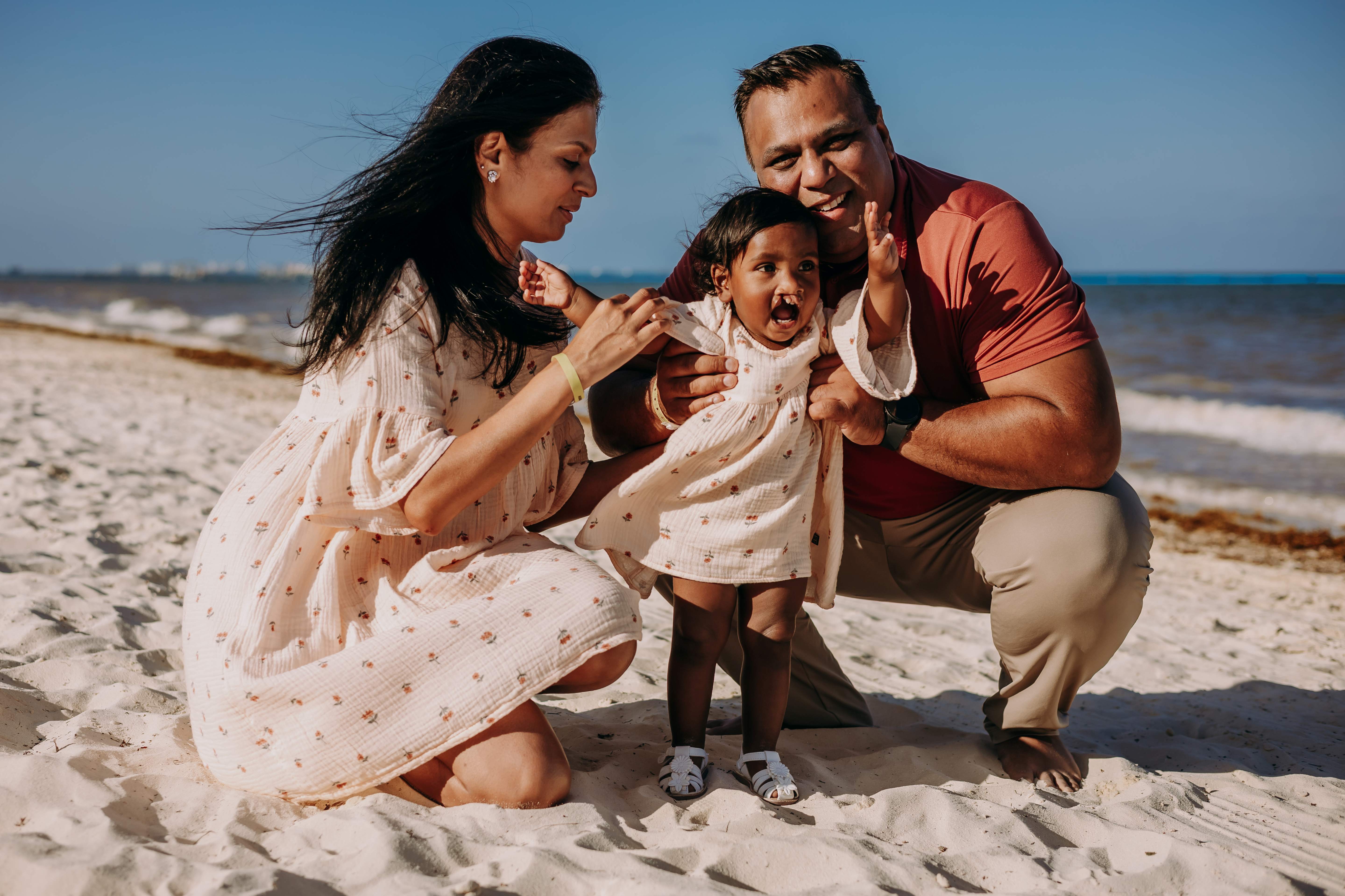 A family who adopted children through IAN