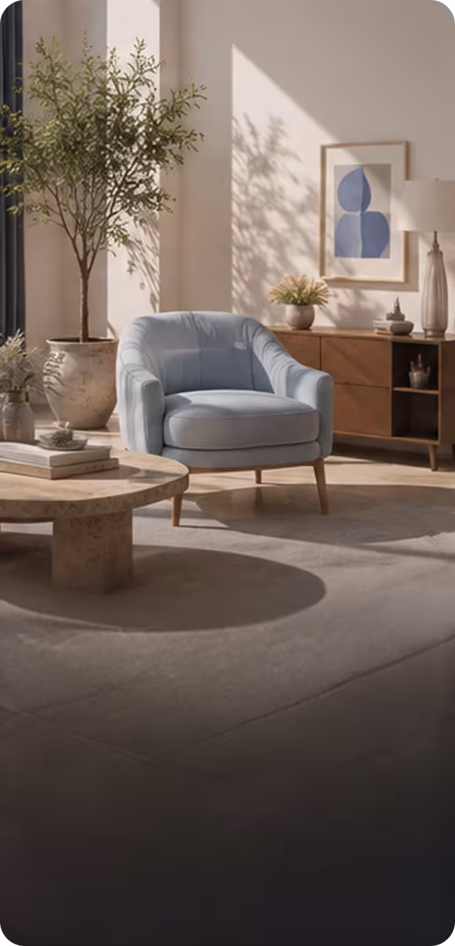 Modern living room with blue armchair, wooden coffee table, potted plants, and sideboard with decor.
