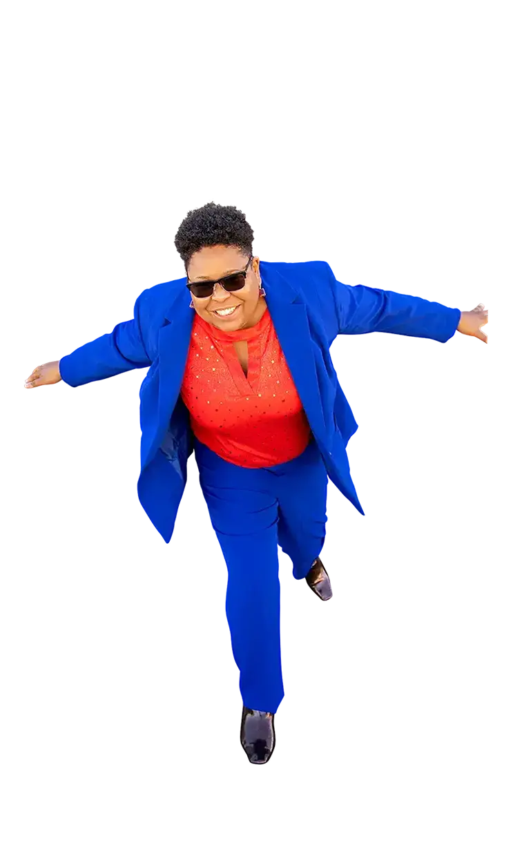 Harmony Conductor Dr. Brandy Biglow from Renovation Integrative Health leans forward as she shows her humor