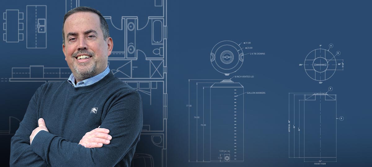 Percheron Plastic owner Matt Tanguay with technical drawings of polyethylene storage tanks