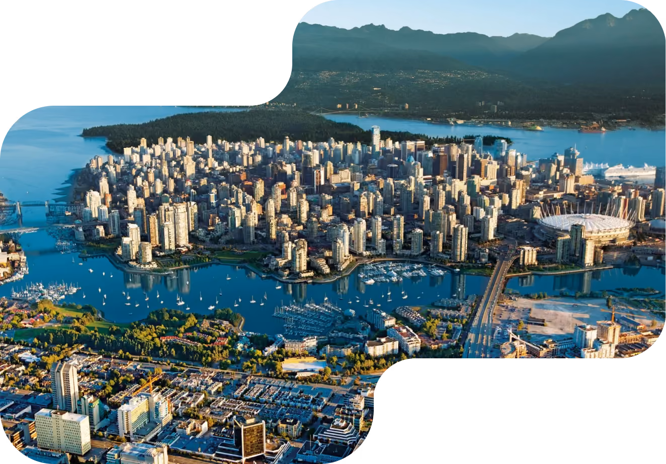 A top angle city image with rivers going through middle