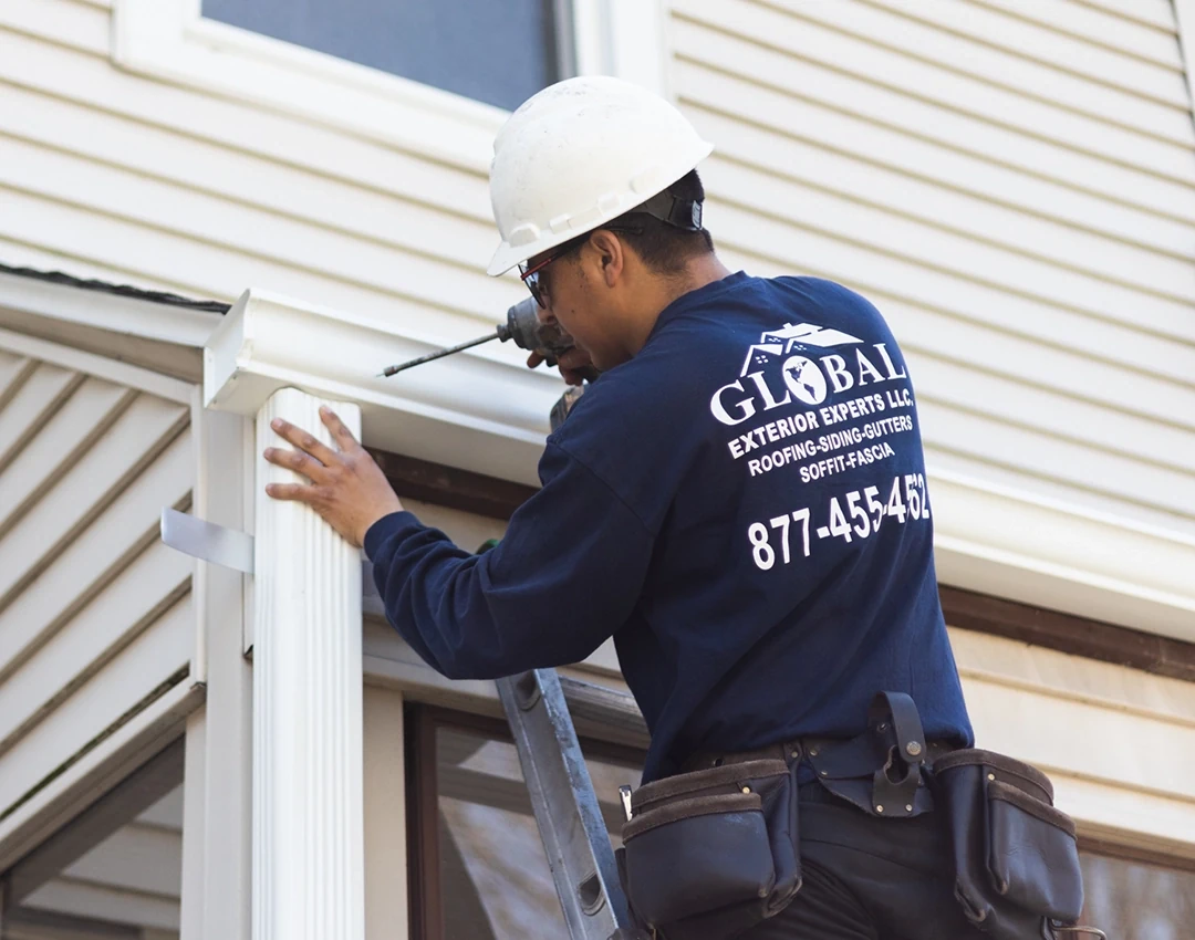 Installing new gutters and downspout.