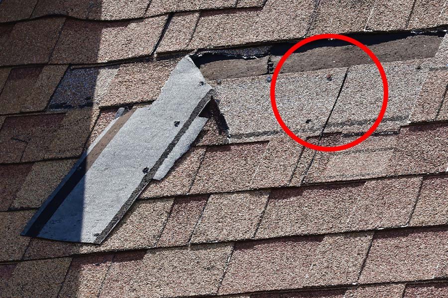 Missing Shingles with exposed fasteners