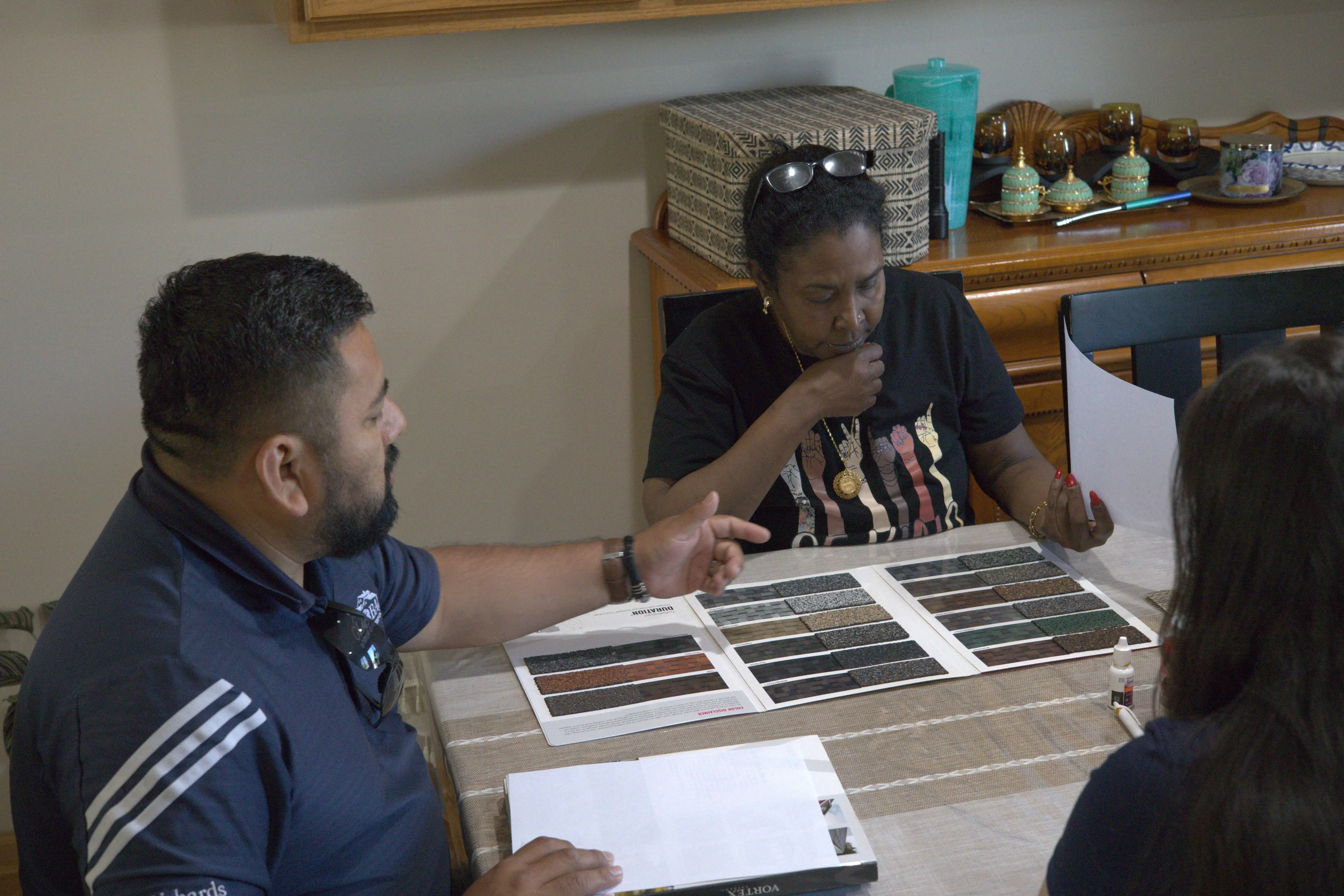 Picking Out Roof Material With Customer | Global Exterior Experts