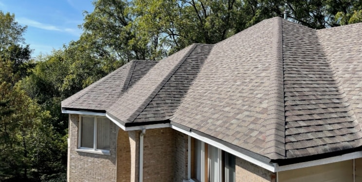Light Colored Shingles Installed On Residential Roof