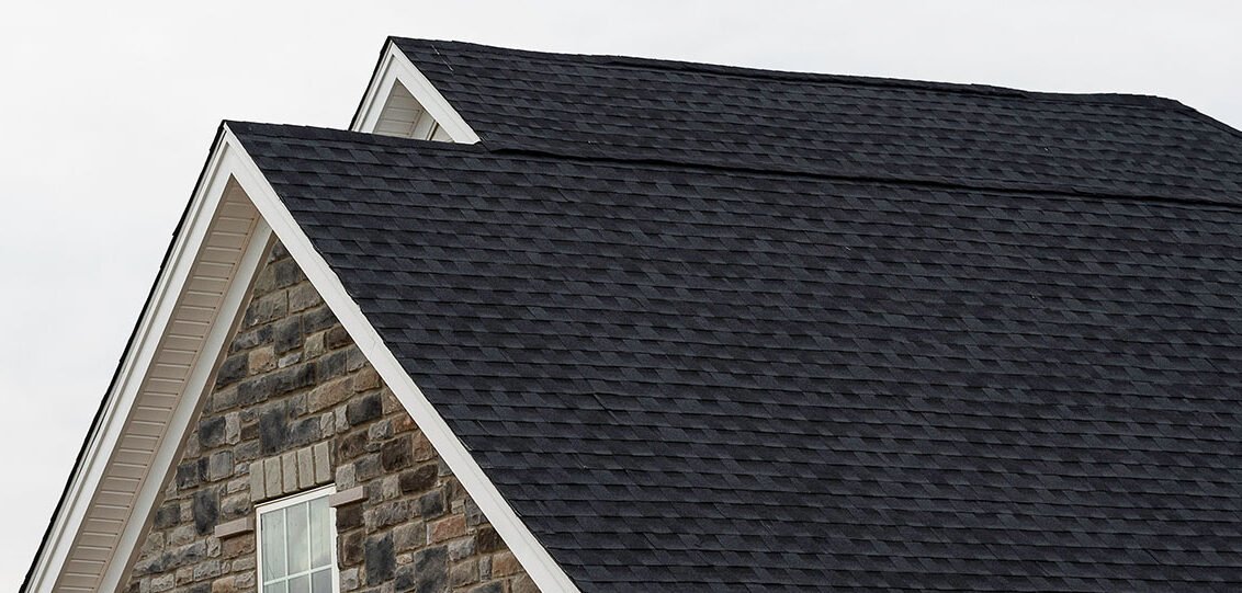 Dark Roof Shingles Installed On Residential Roof