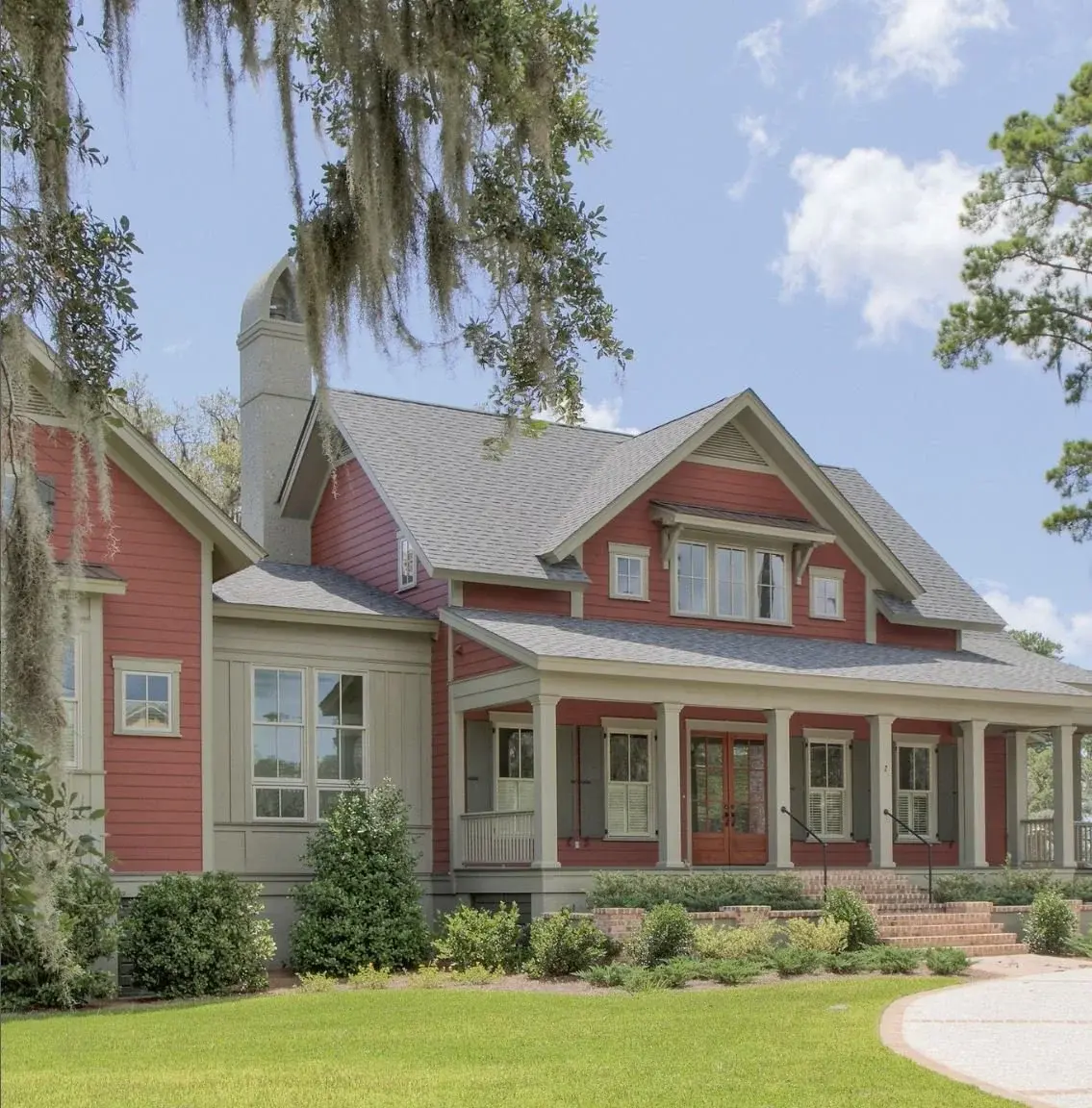 Boldly Colored Pink Siding & Grey Shingle Roof