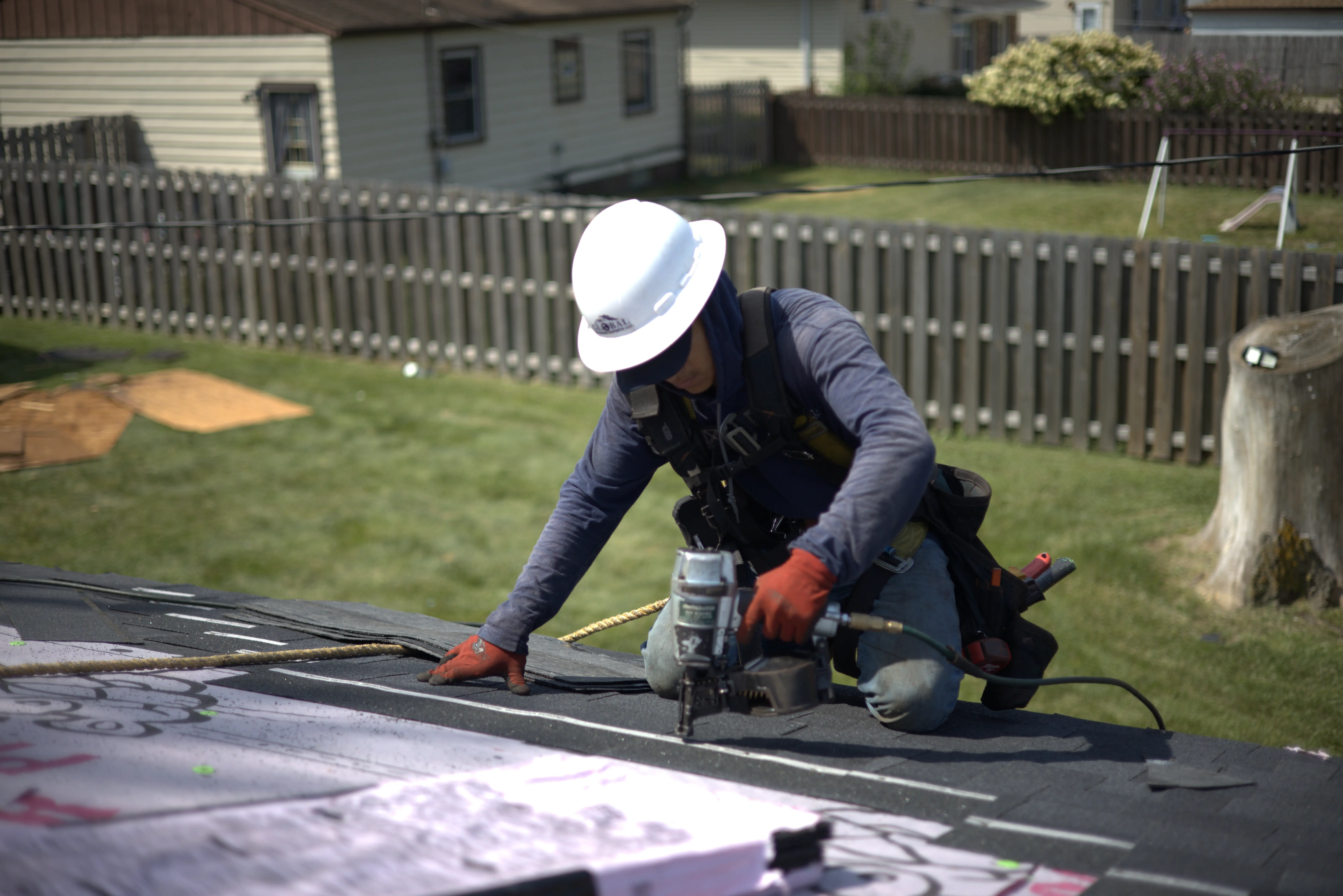 Global Exterior Experts Roofer Installing A Residential Roof