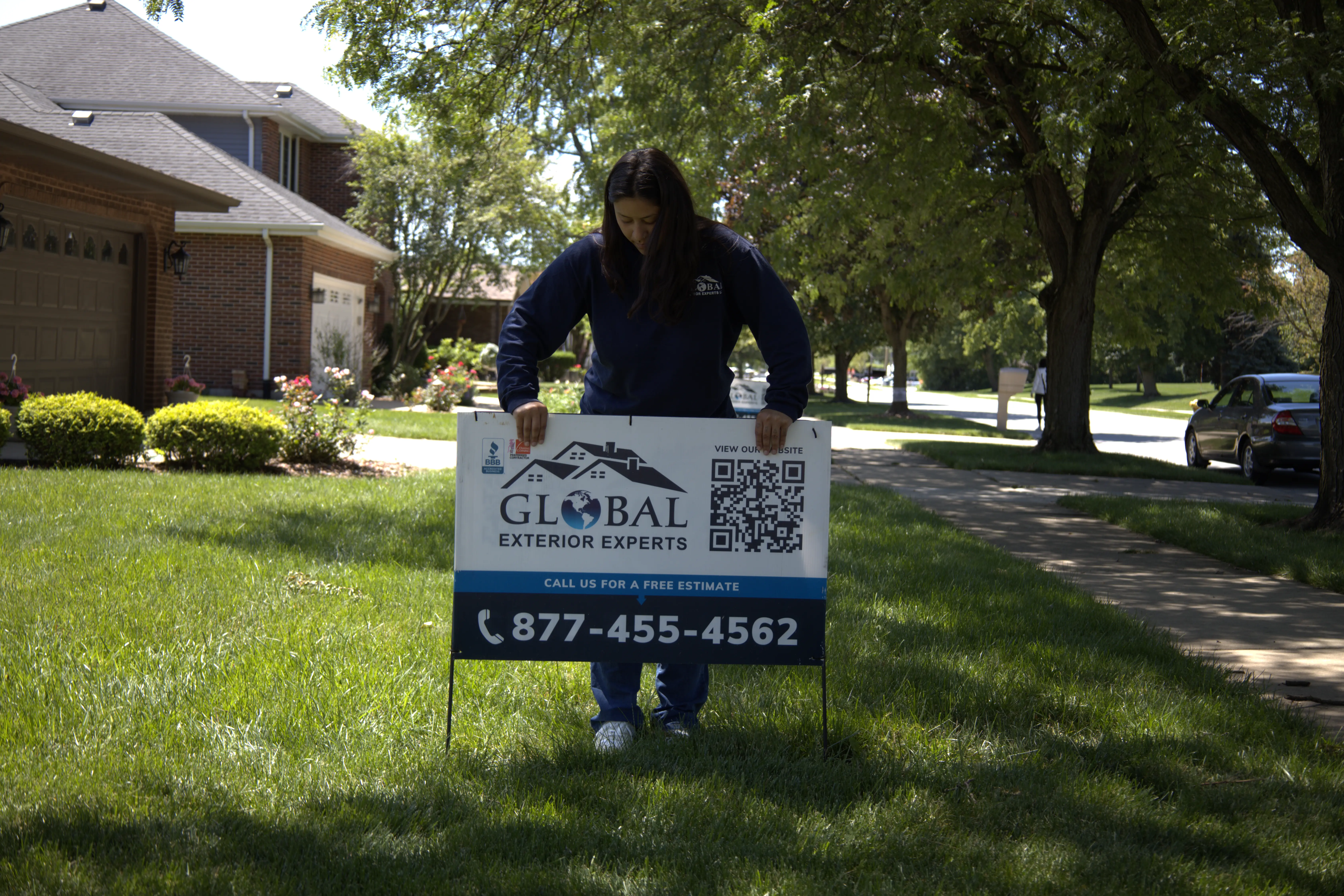 Sticking A Yard Sign Down For Gkobal Exterior Experts Project