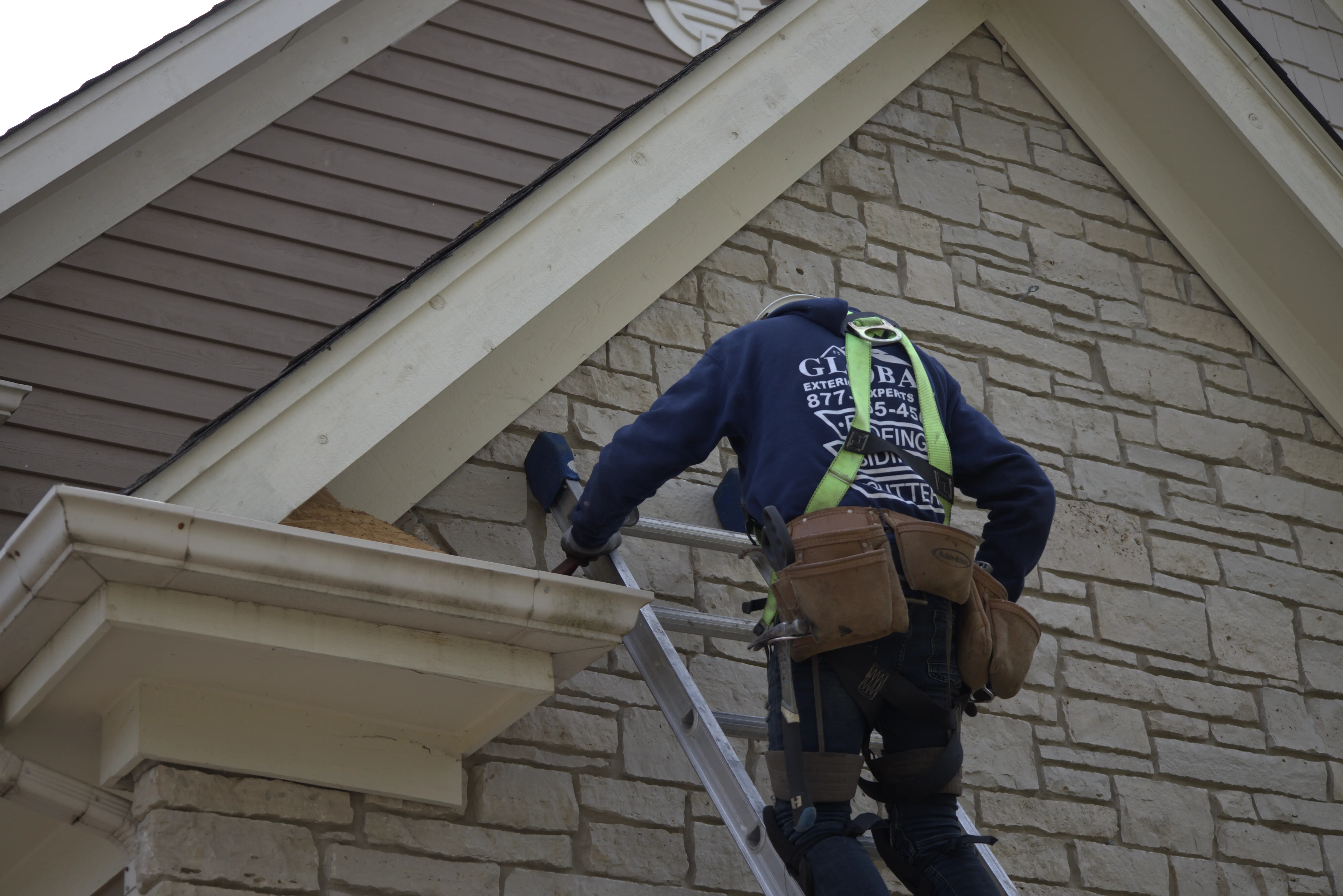 Scraping And Replacing a tiny corner of a roof below the eve of the roof