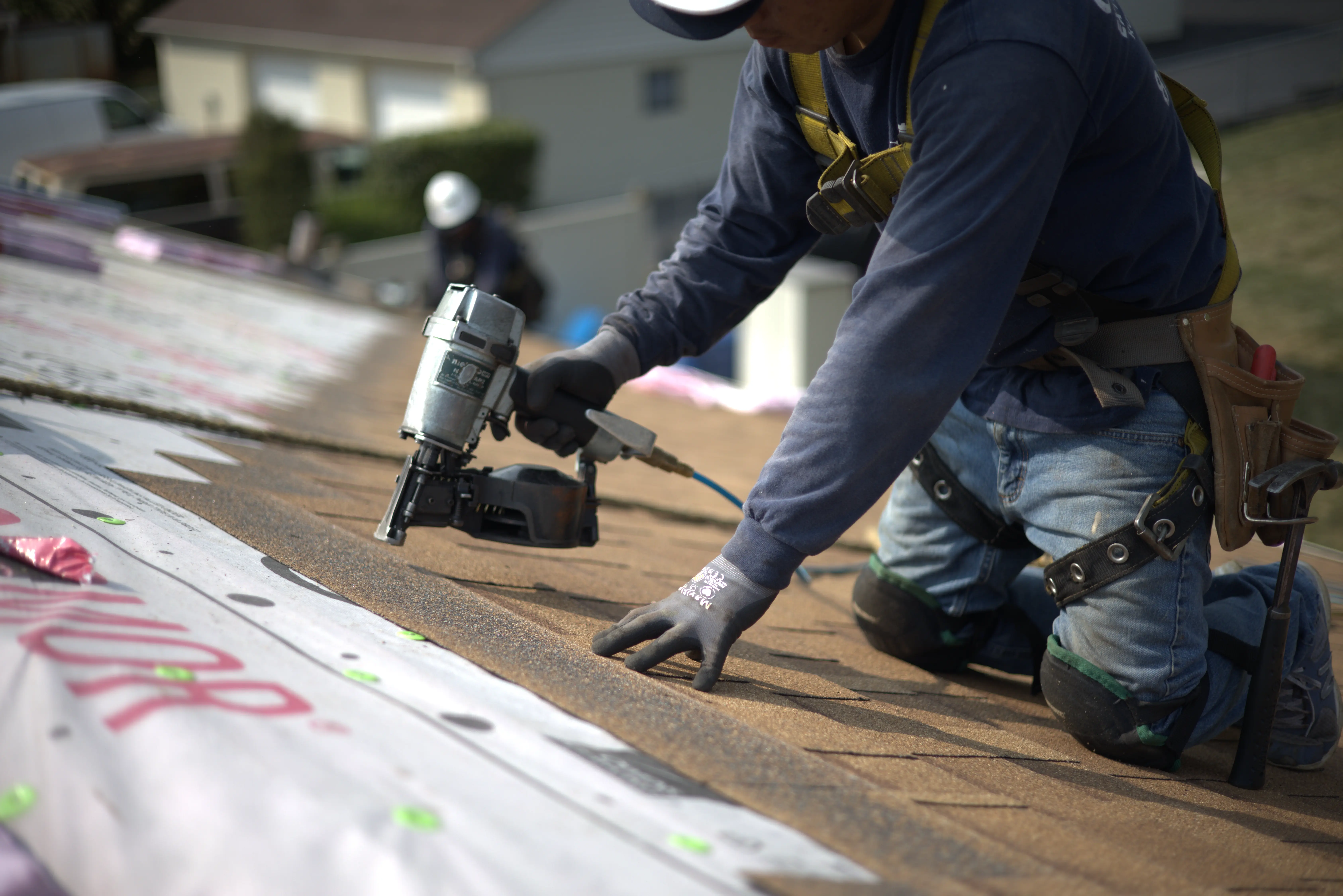 Global Exterior Experts Roofer Installing Shingle Roof on Reisdential Home