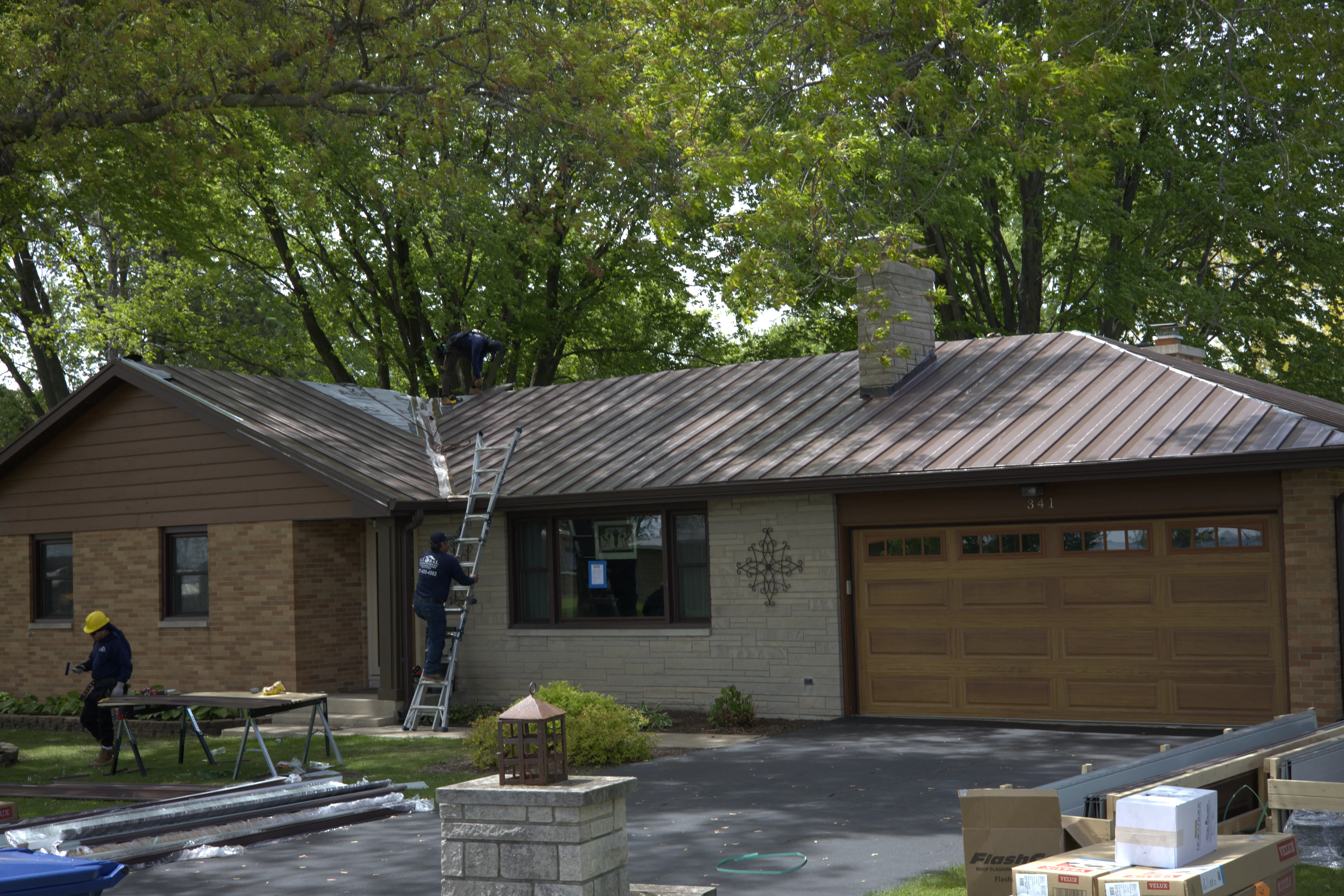 Standing Seem Metal Roof Being Installed By Global Exterior Experts Roofers