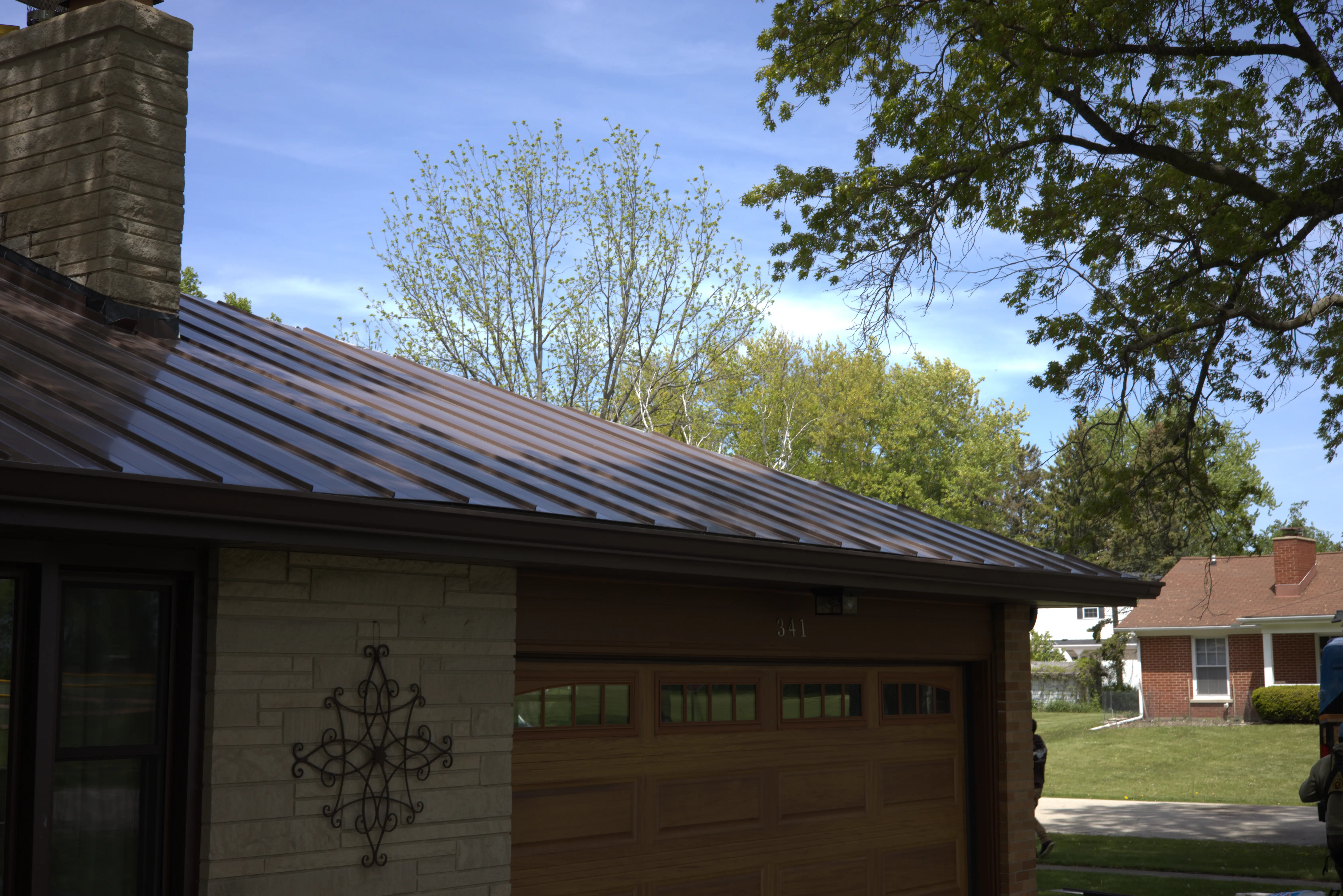 Brown Standing Seem Metal Roof Installed on Residential Home