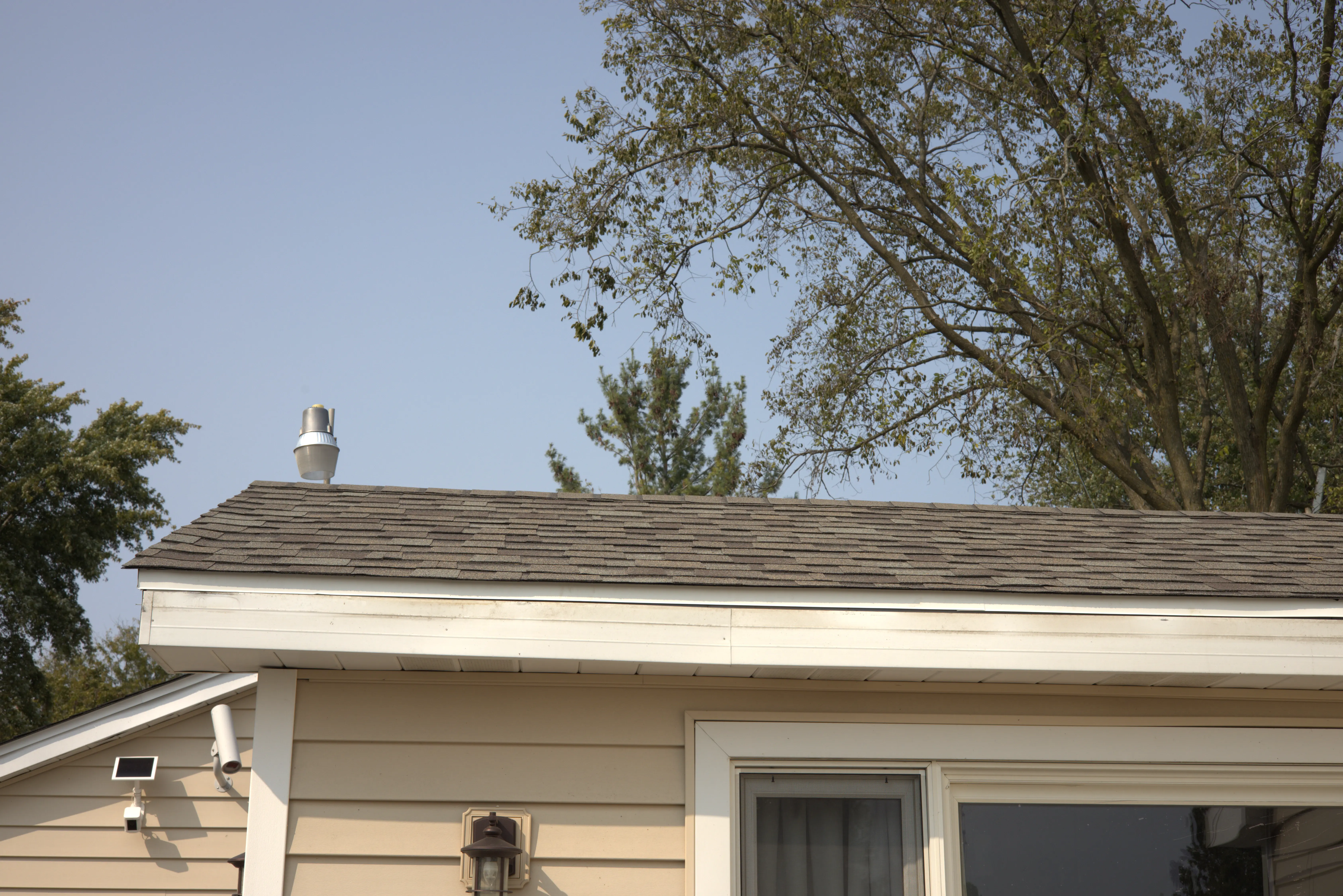 Freshly Completed Residential Roof Replacement Shingle Installation