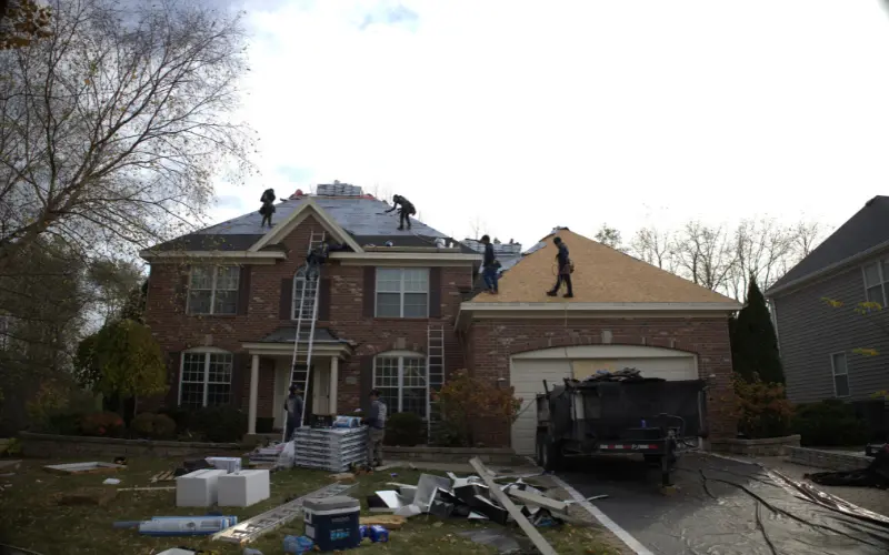 Roofers Replacing A 2 story residential roof