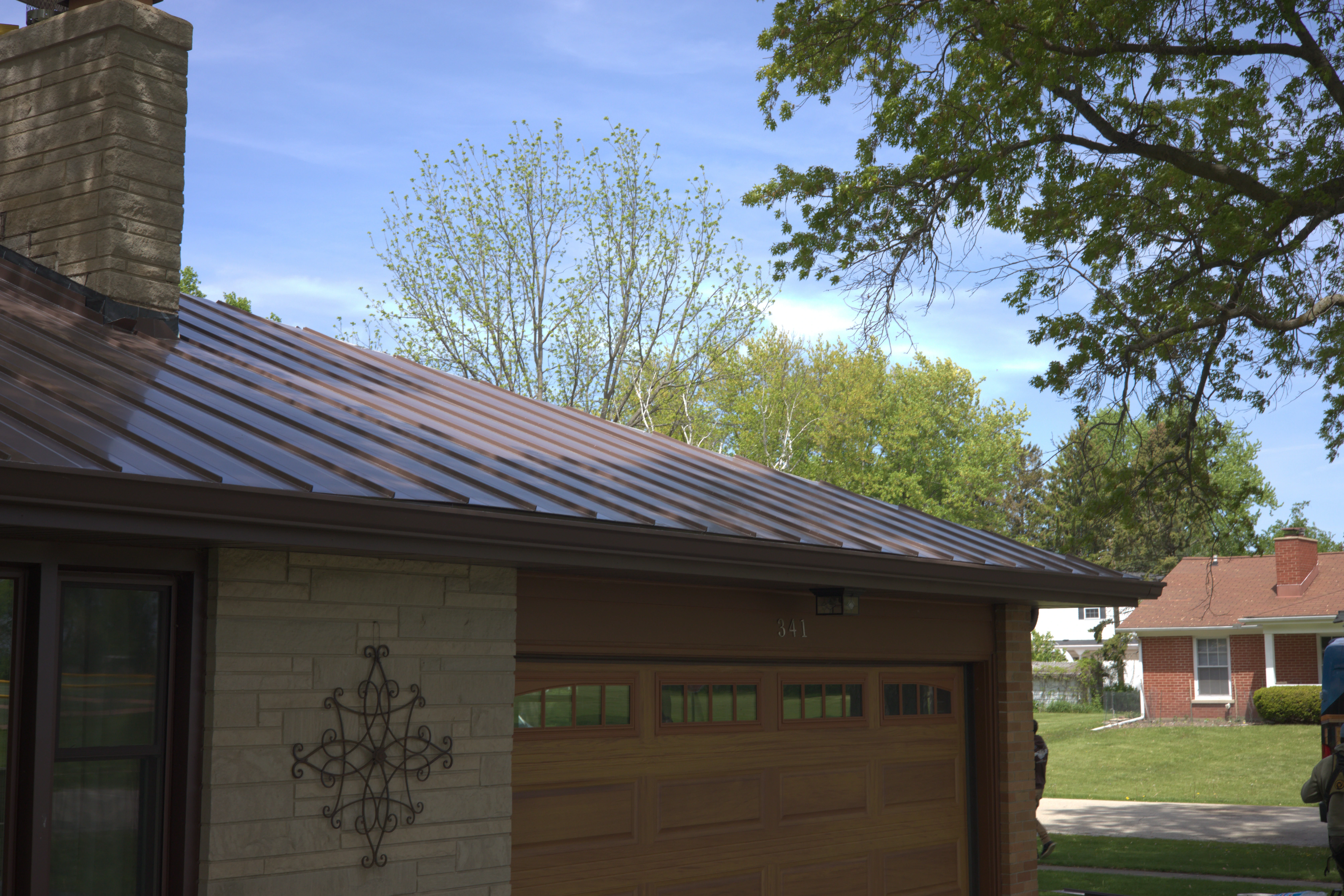 Brown Metal Roof Installed On A Residential Home