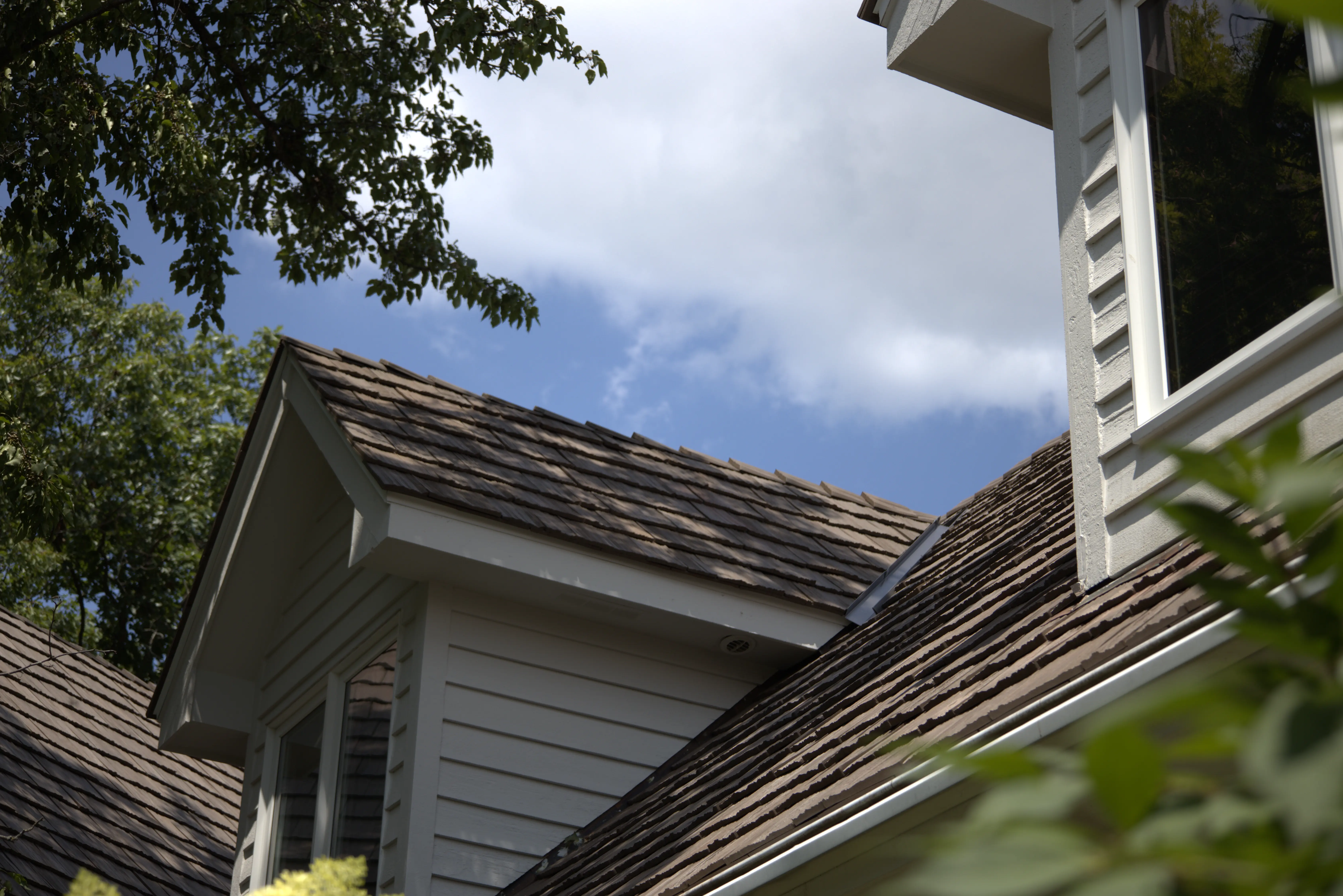 Fully Replaced Roof With Synthetic Slate Roofing Material