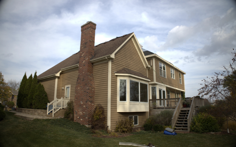 One Side Of A Residential Home Getting A Roof Replacement