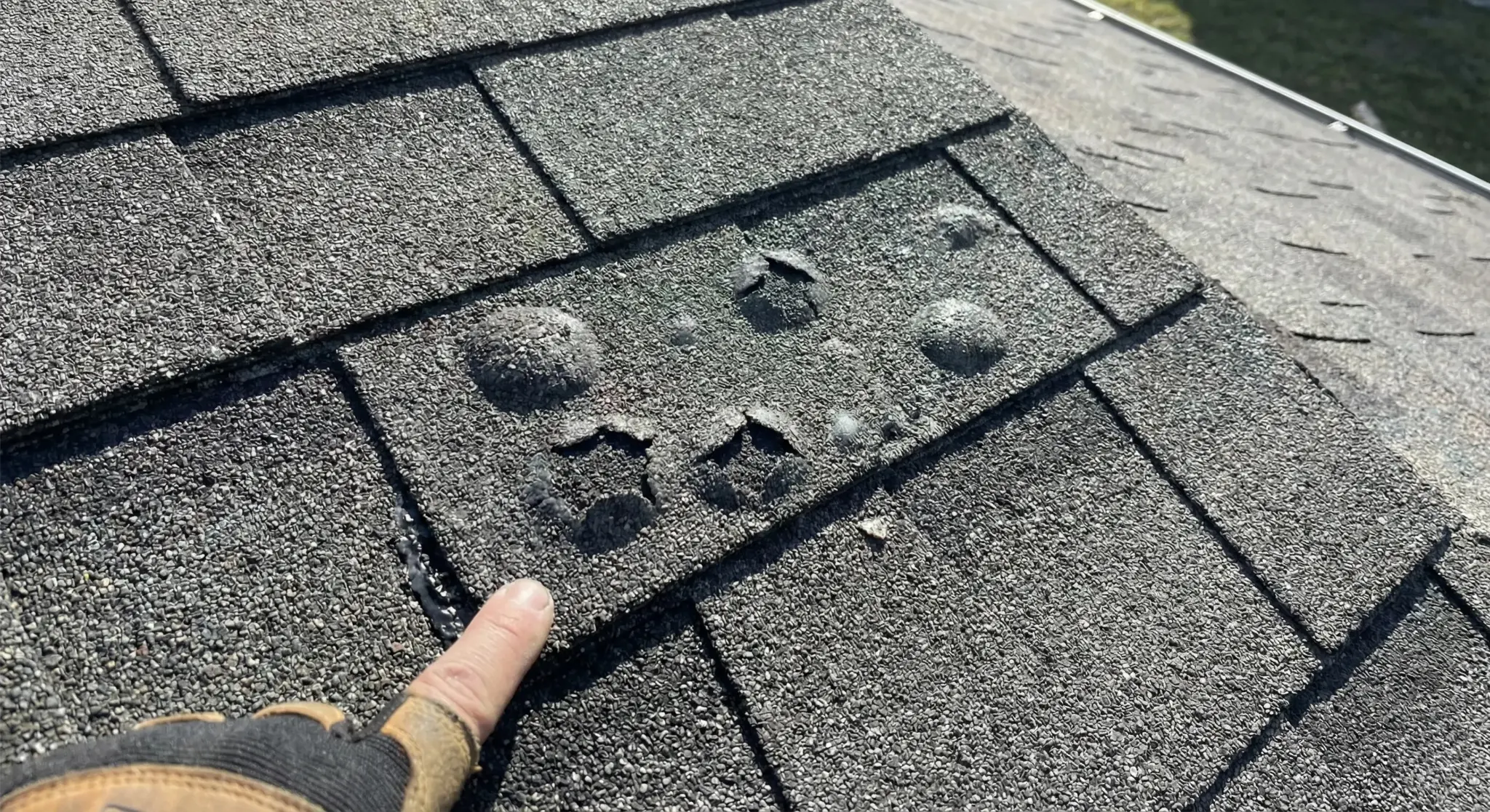 Manufacture Damaged Roof Shingle That's Blistering