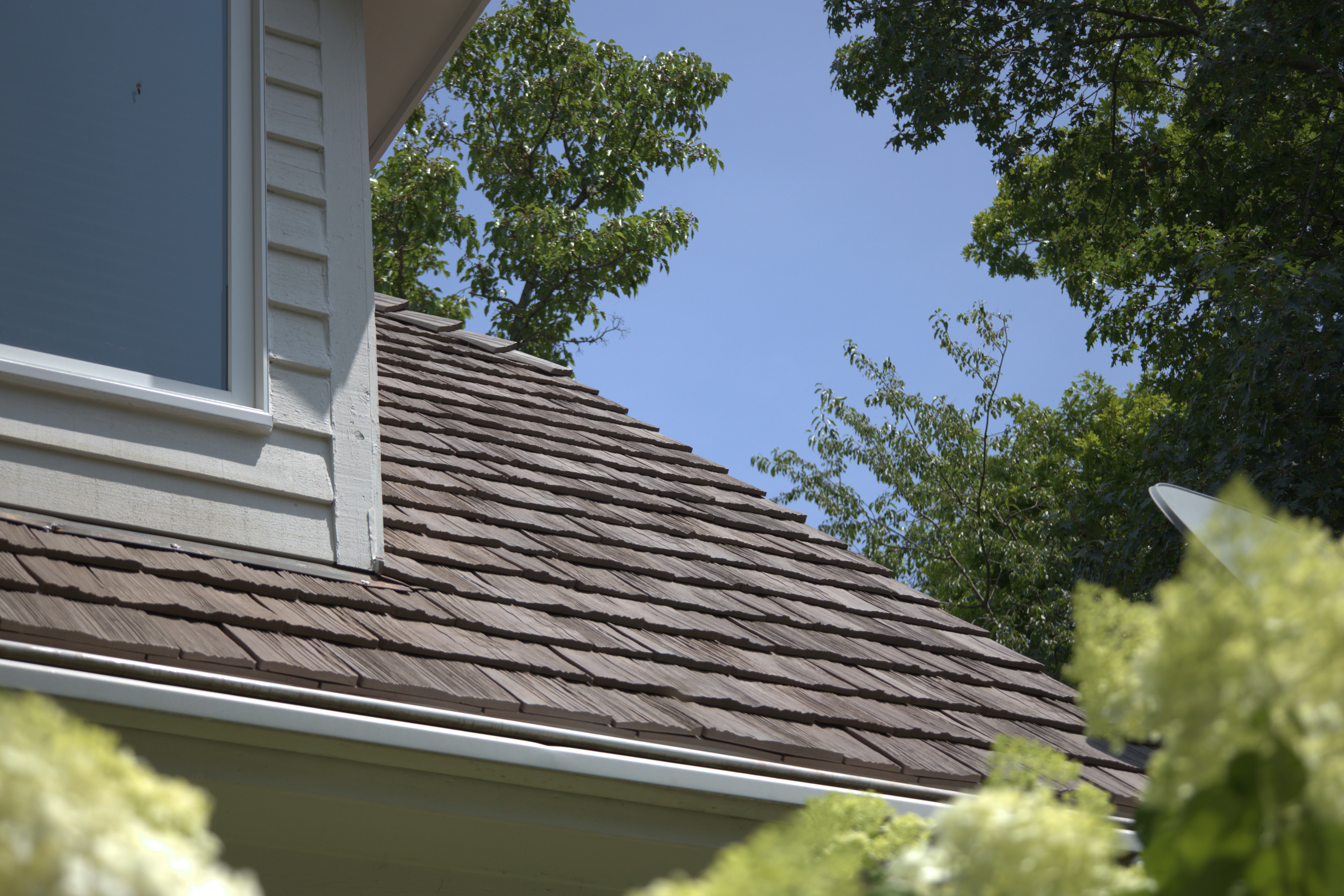 Synthetic Wood shake roofing product Installed On Residential Roof
